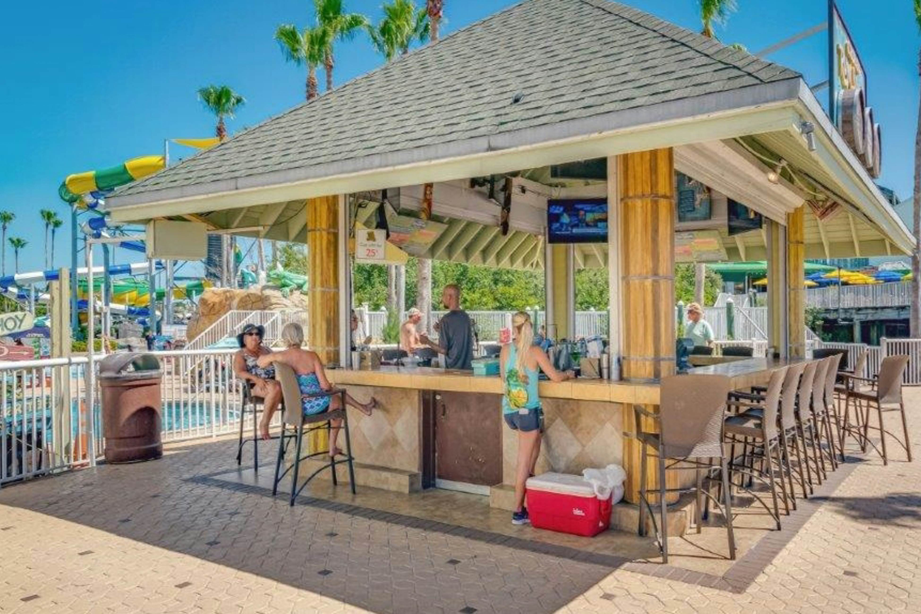 Stylish, snowbird-friendly condo near the beach with AC & W/D - dog-friendly