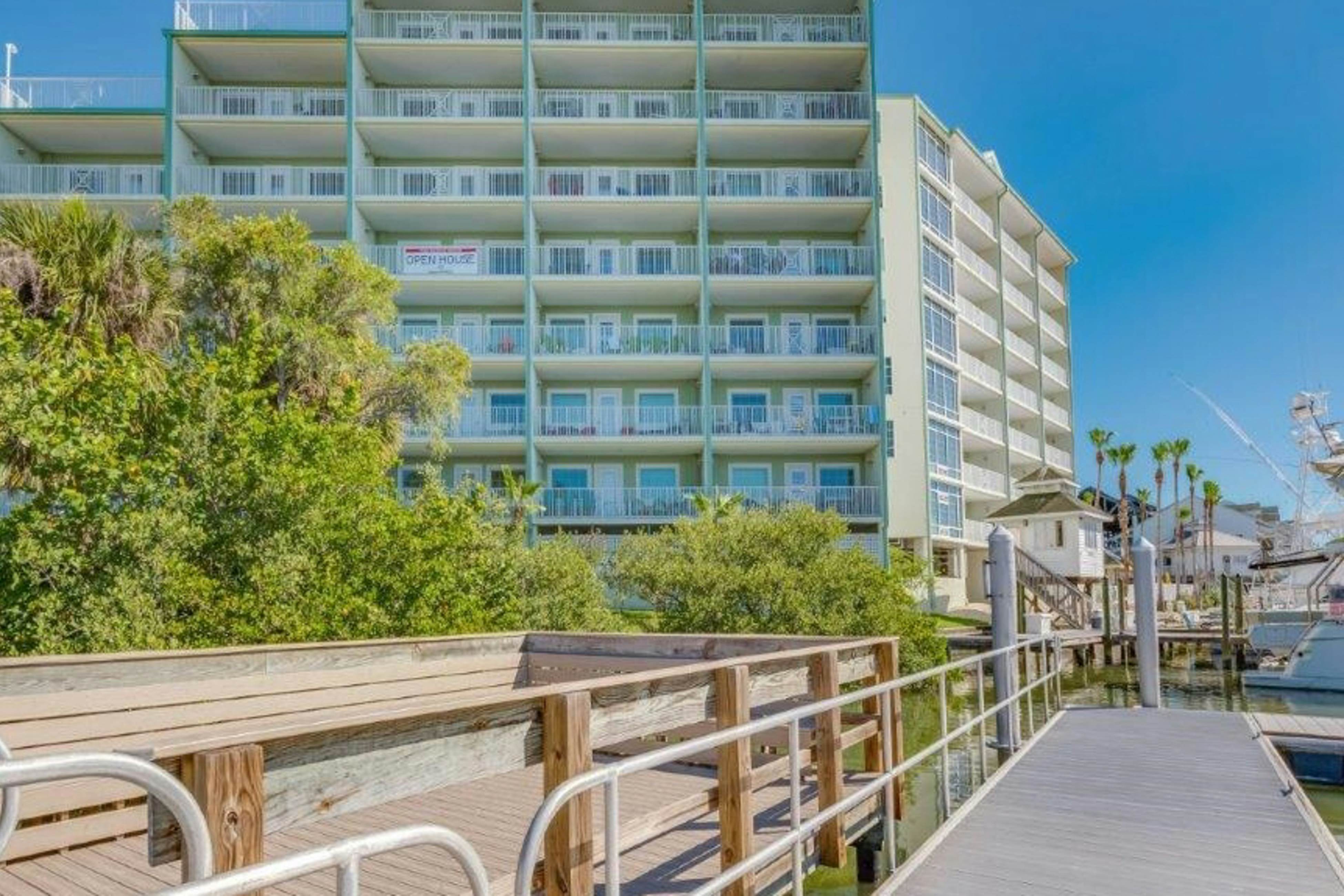 Stylish, snowbird-friendly condo near the beach with AC & W/D - dog-friendly