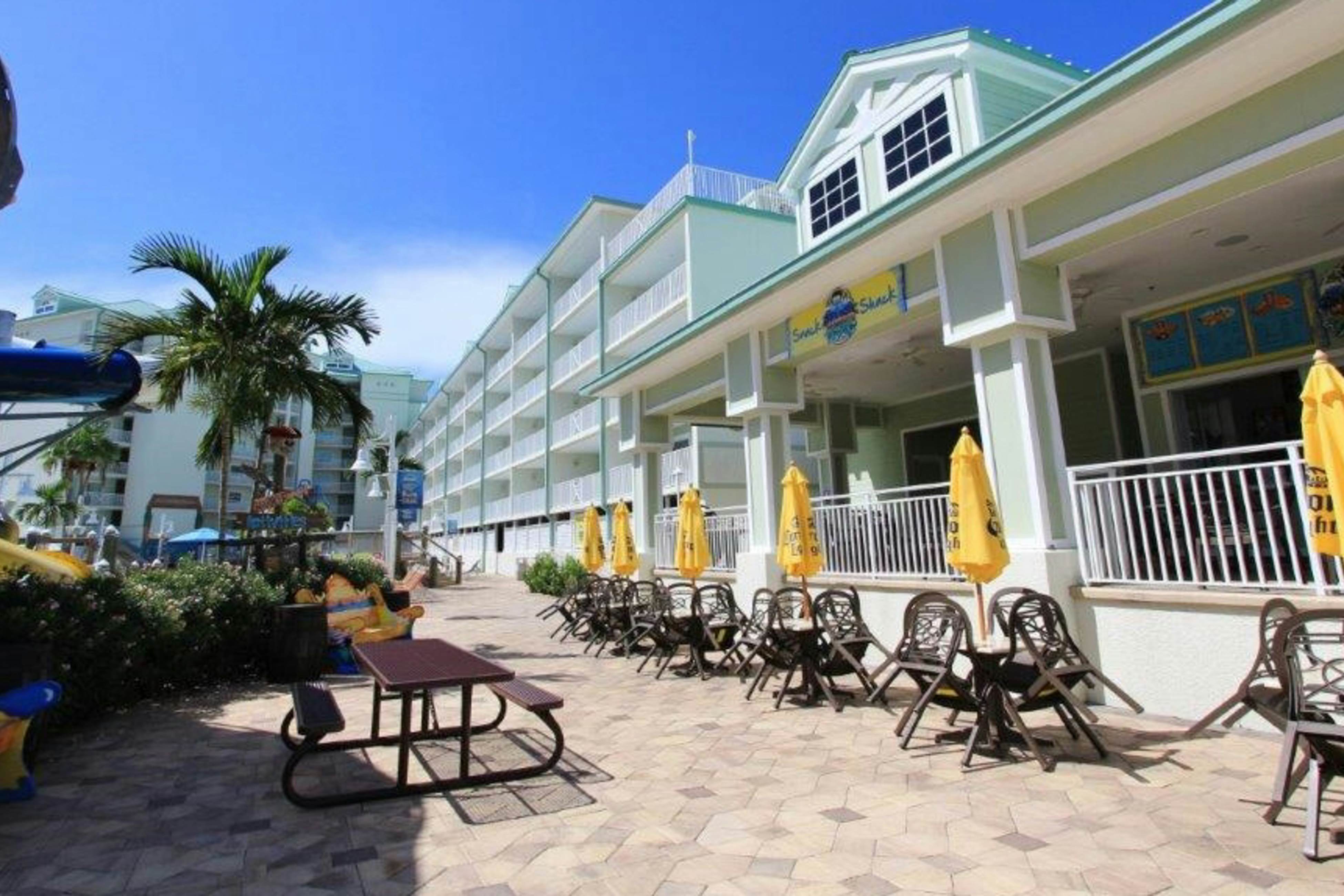 Stylish, snowbird-friendly condo near the beach with AC & W/D - dog-friendly