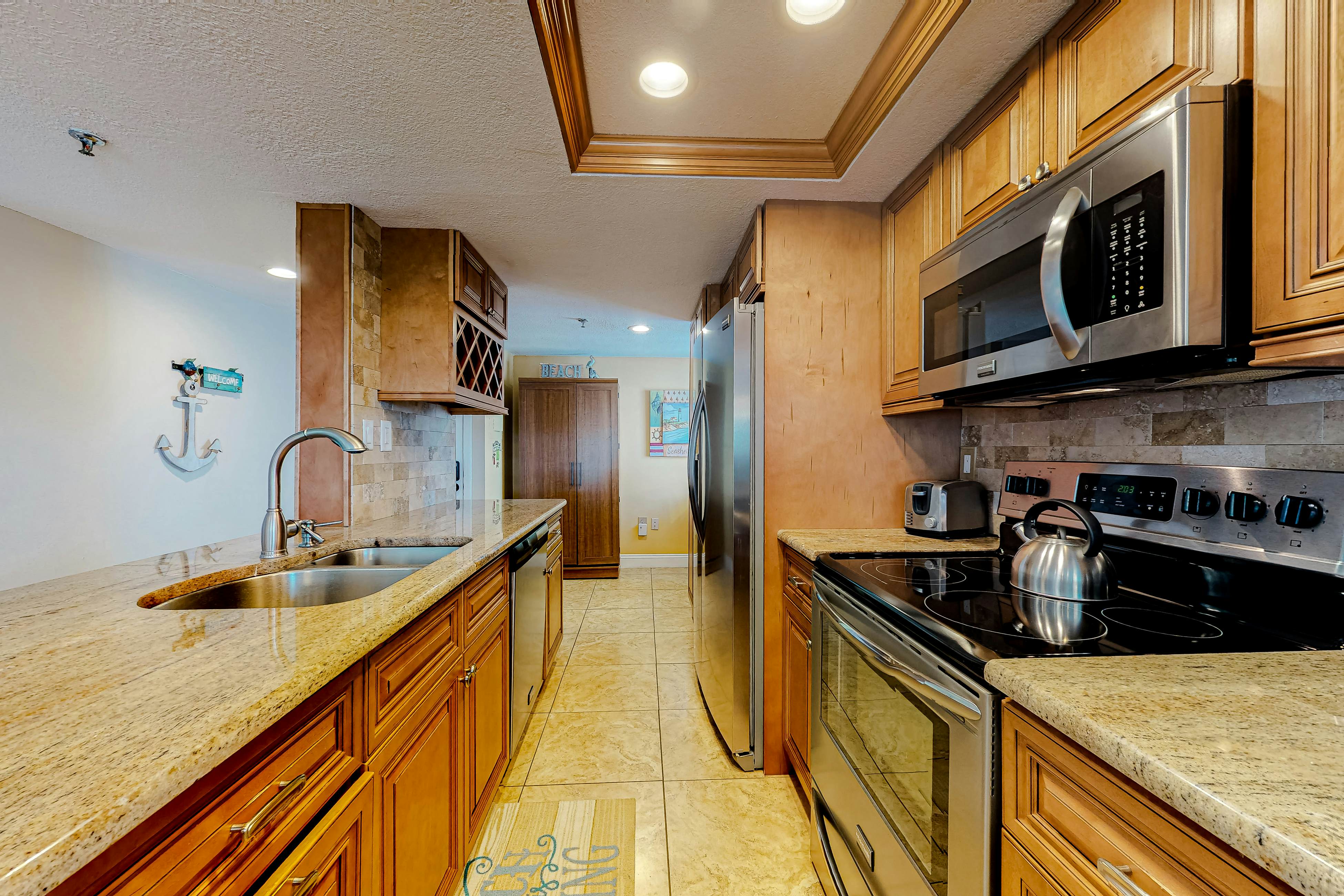 Waterfront condo with heated pool, hot tub, central AC & W/D - snowbird-friendly