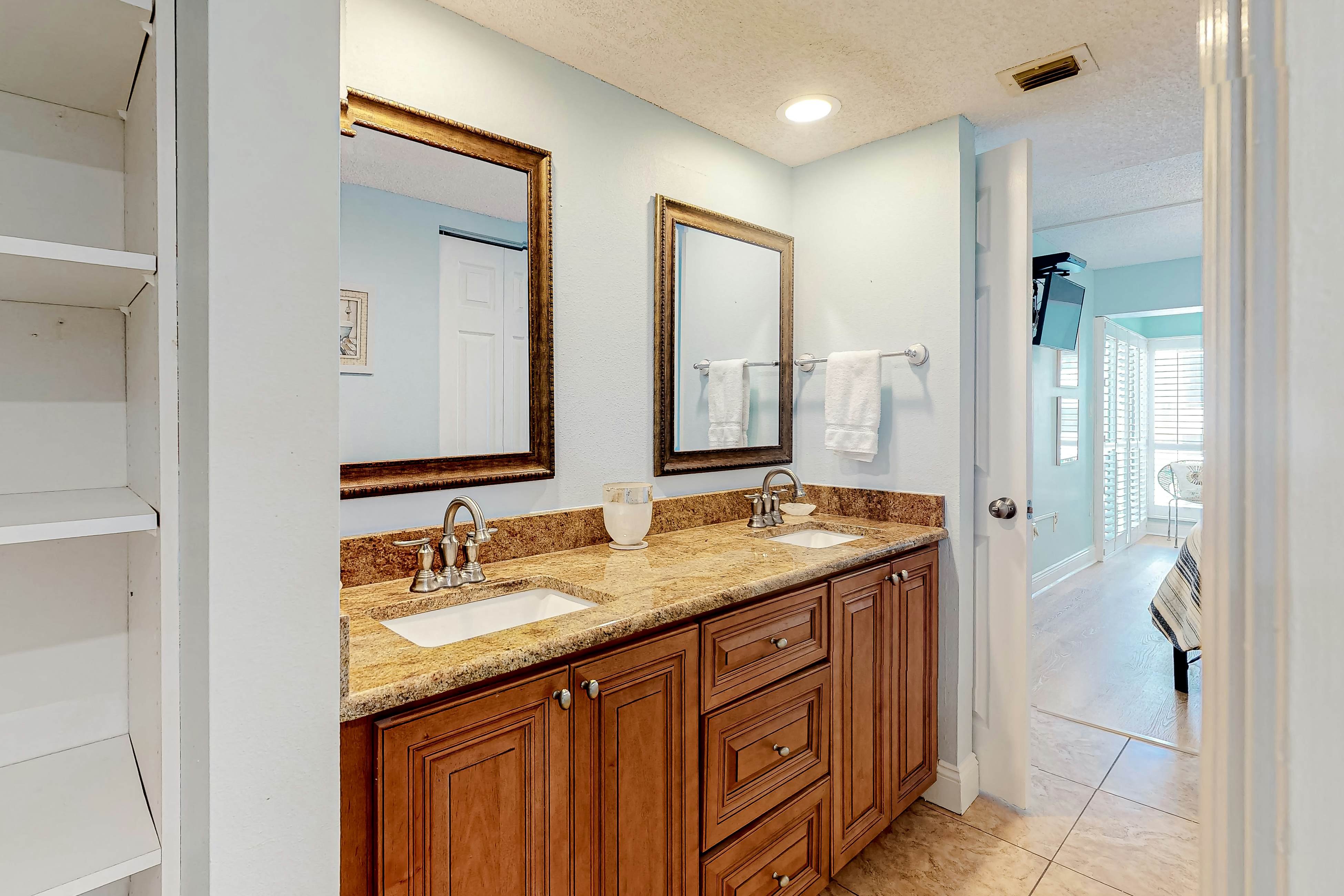 Waterfront condo with heated pool, hot tub, central AC & W/D - snowbird-friendly