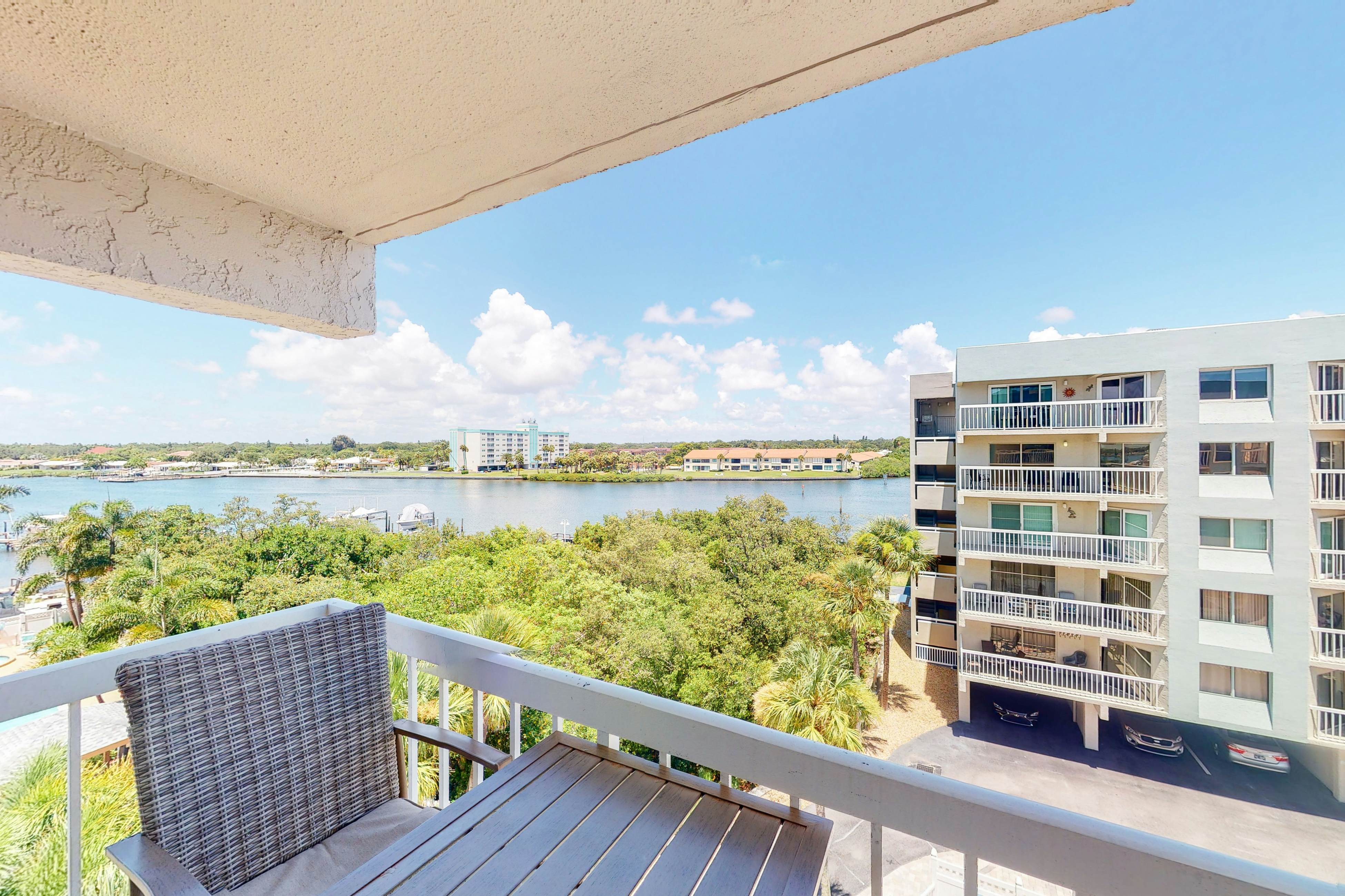 Waterfront condo with heated pool, hot tub, central AC & W/D - snowbird-friendly