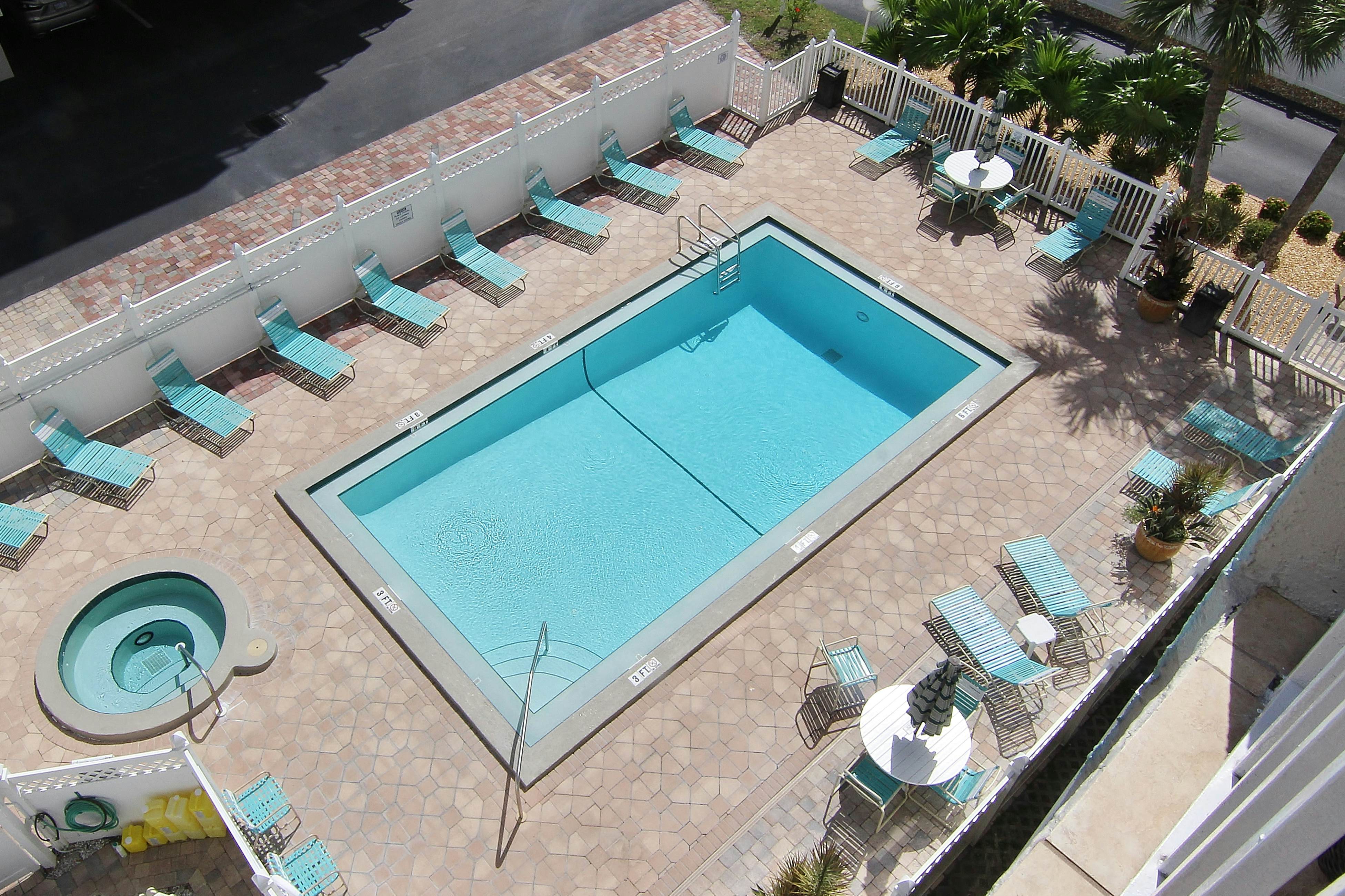 Waterfront condo with heated pool, hot tub, central AC & W/D - snowbird-friendly