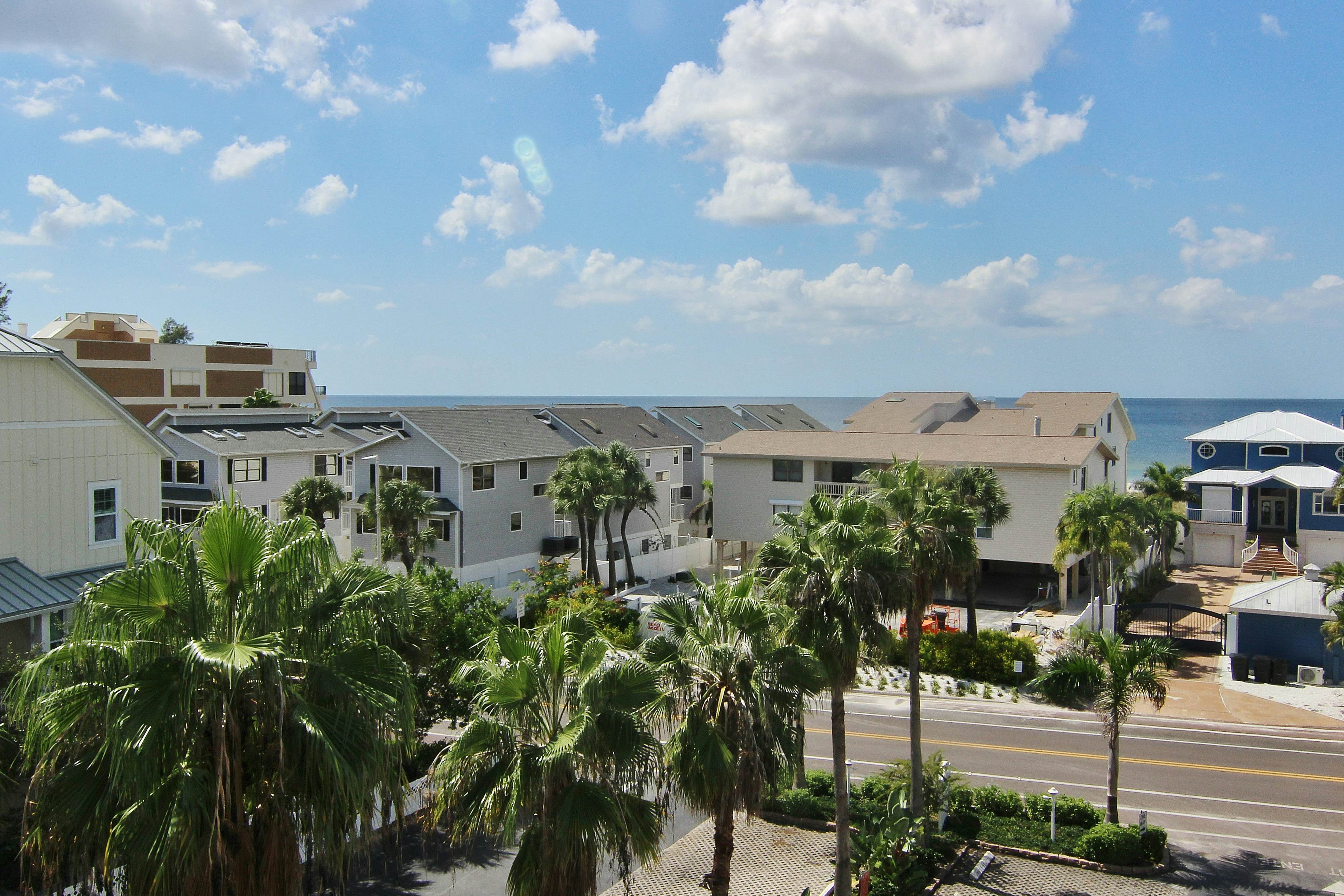 Waterfront condo with heated pool, hot tub, central AC & W/D - snowbird-friendly