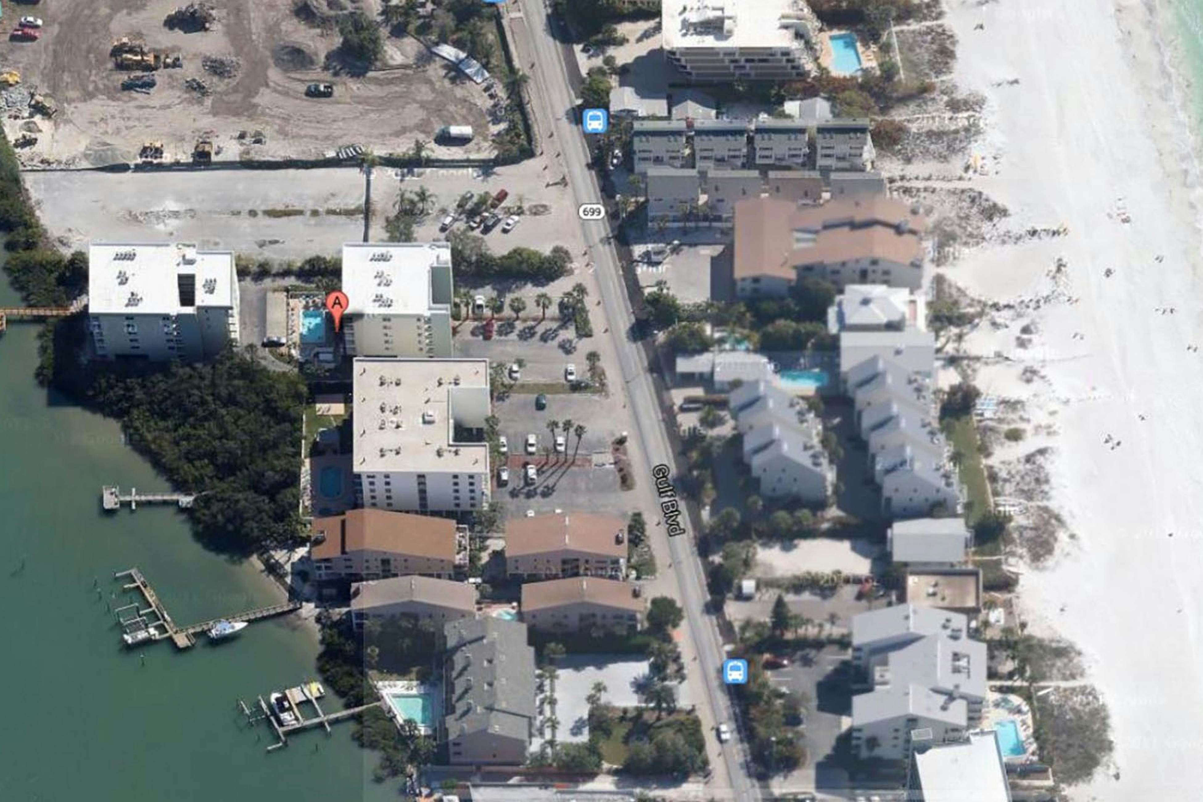 Waterfront condo with heated pool, hot tub, central AC & W/D - snowbird-friendly