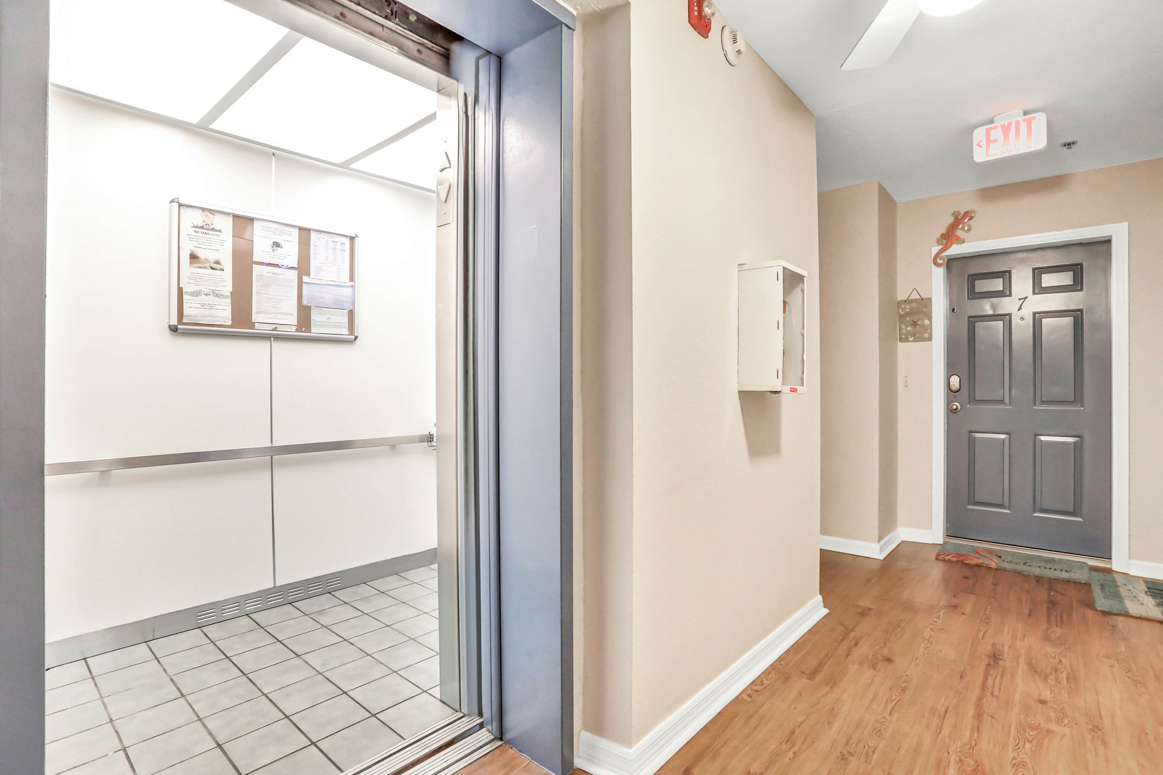 Blissful condo with pool - Gulf-view balcony, private W/D & central AC