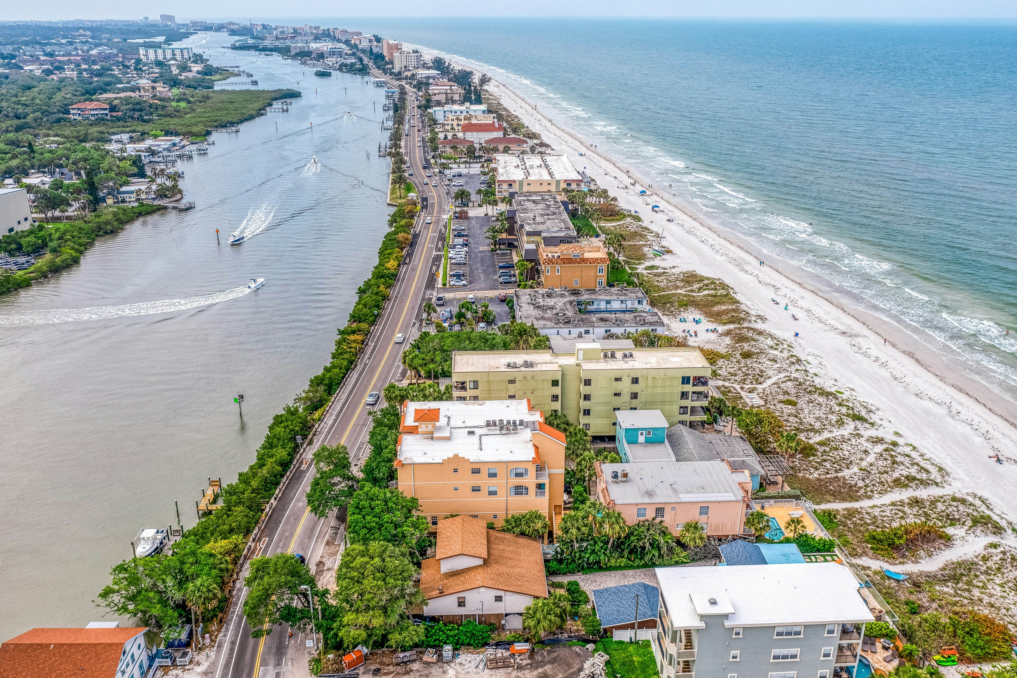 Blissful condo with pool - Gulf-view balcony, private W/D & central AC