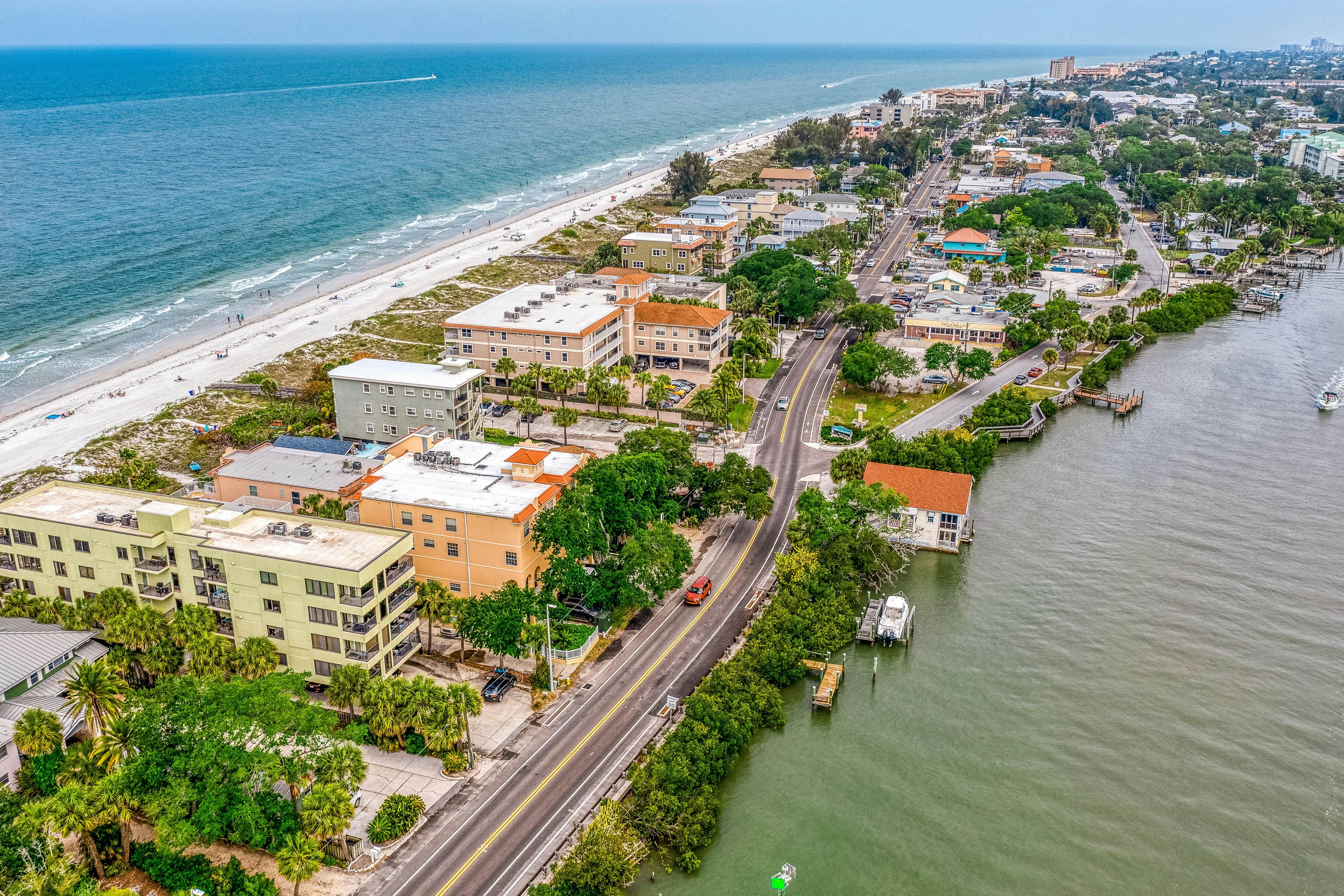 Blissful condo with pool - Gulf-view balcony, private W/D & central AC