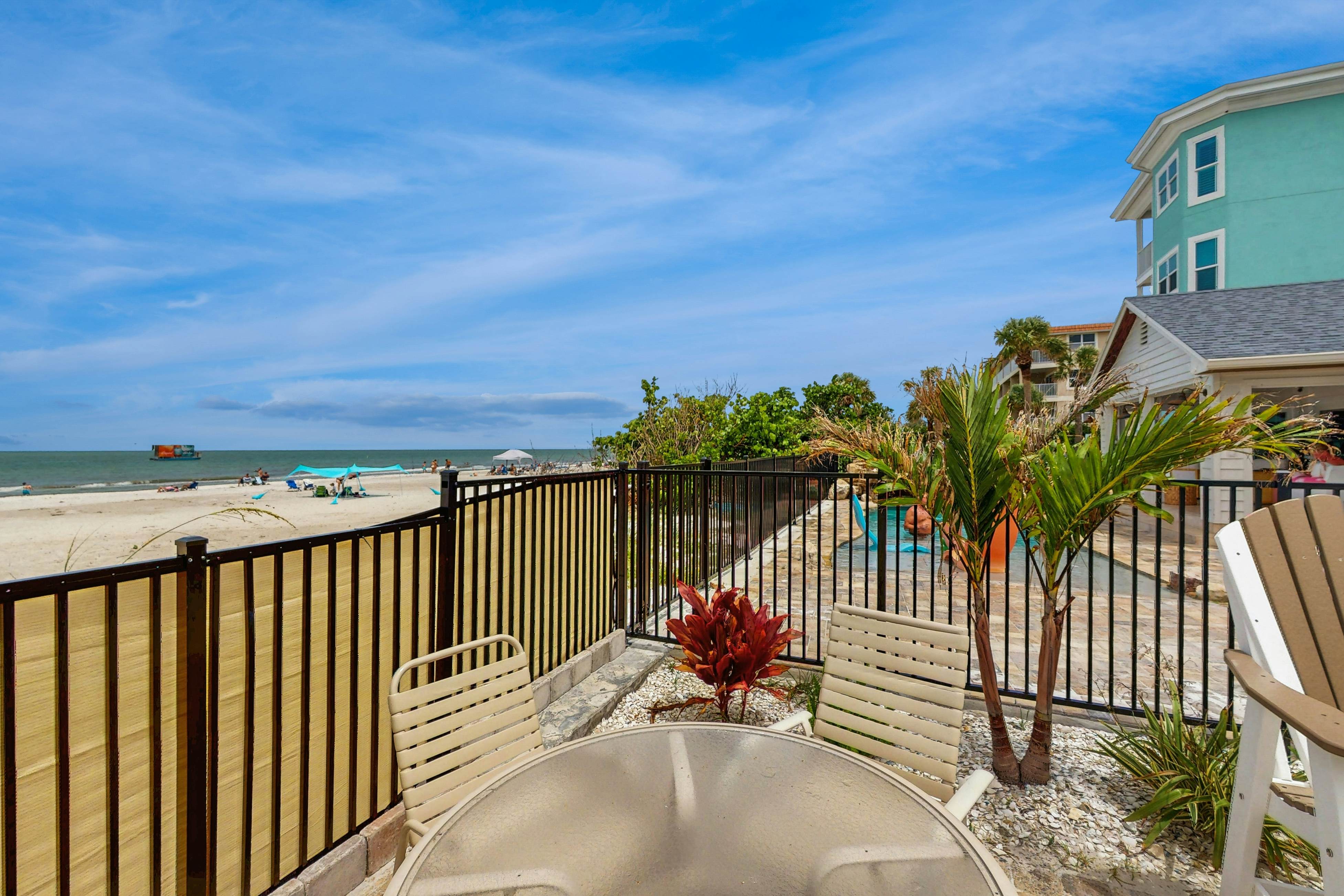 Blissful condo with pool - Gulf-view balcony, private W/D & central AC