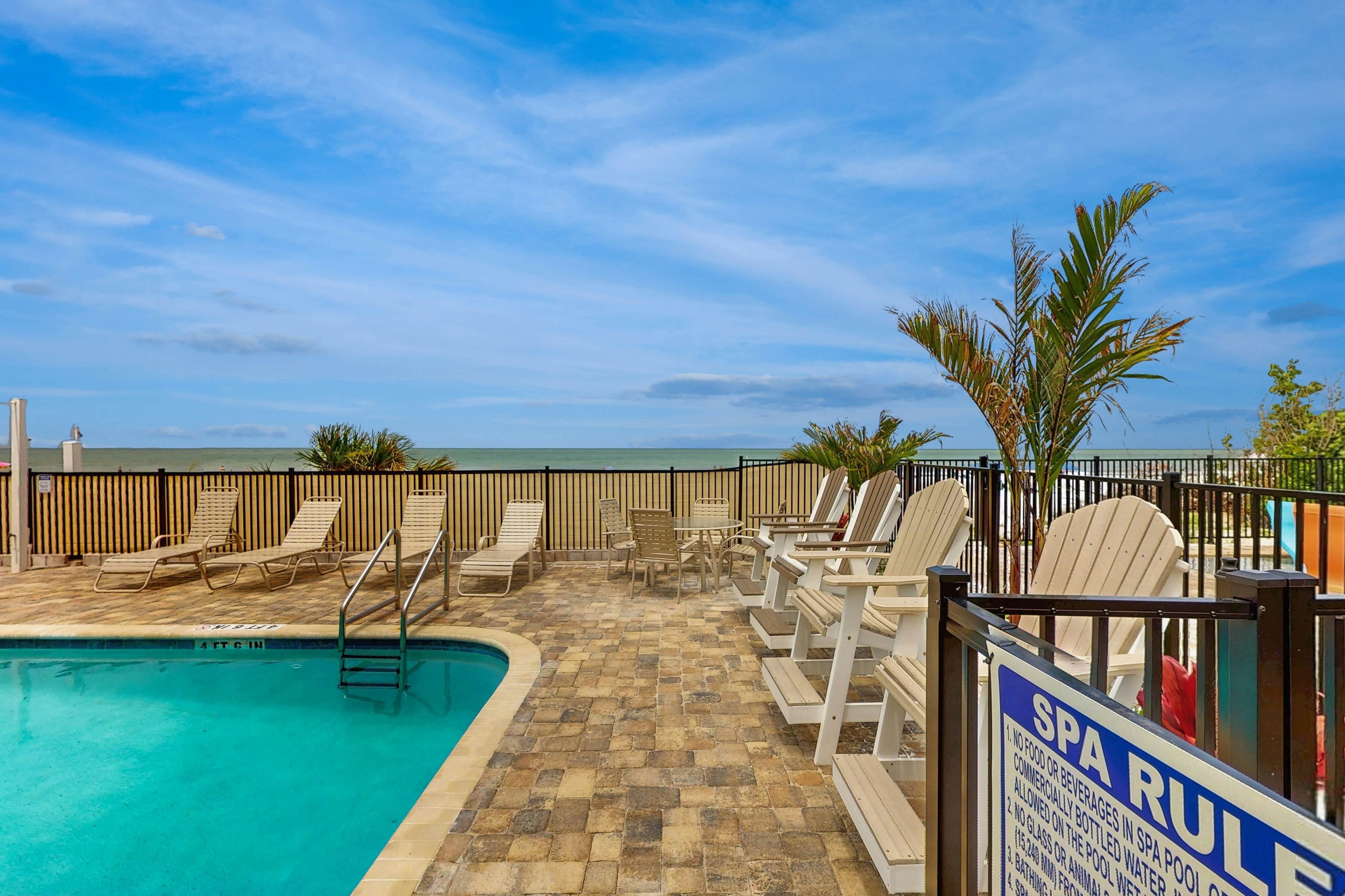 Blissful condo with pool - Gulf-view balcony, private W/D & central AC