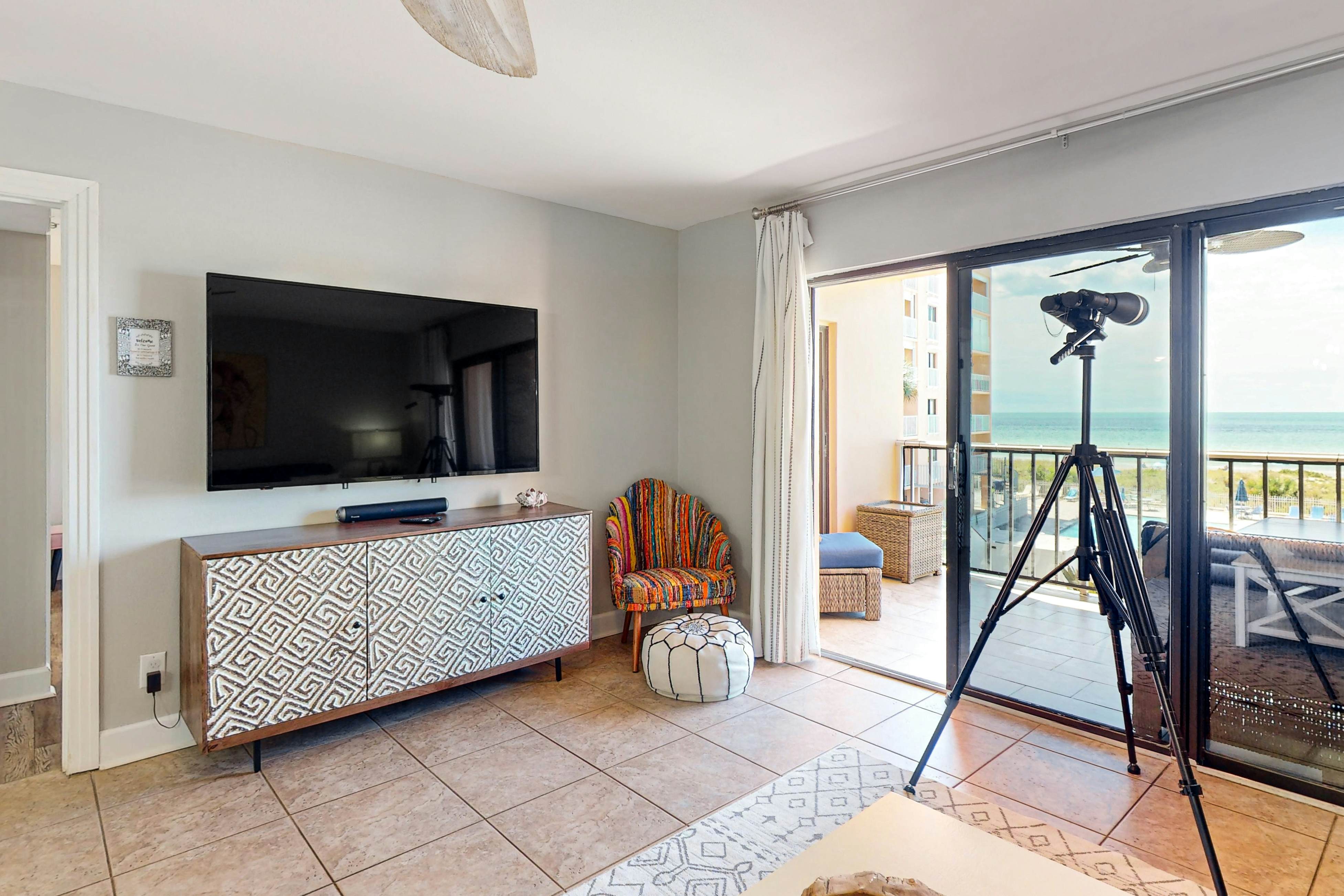 Dog-friendly beachfront condo with pool, hot tub, tennis & AC -snowbird-friendly