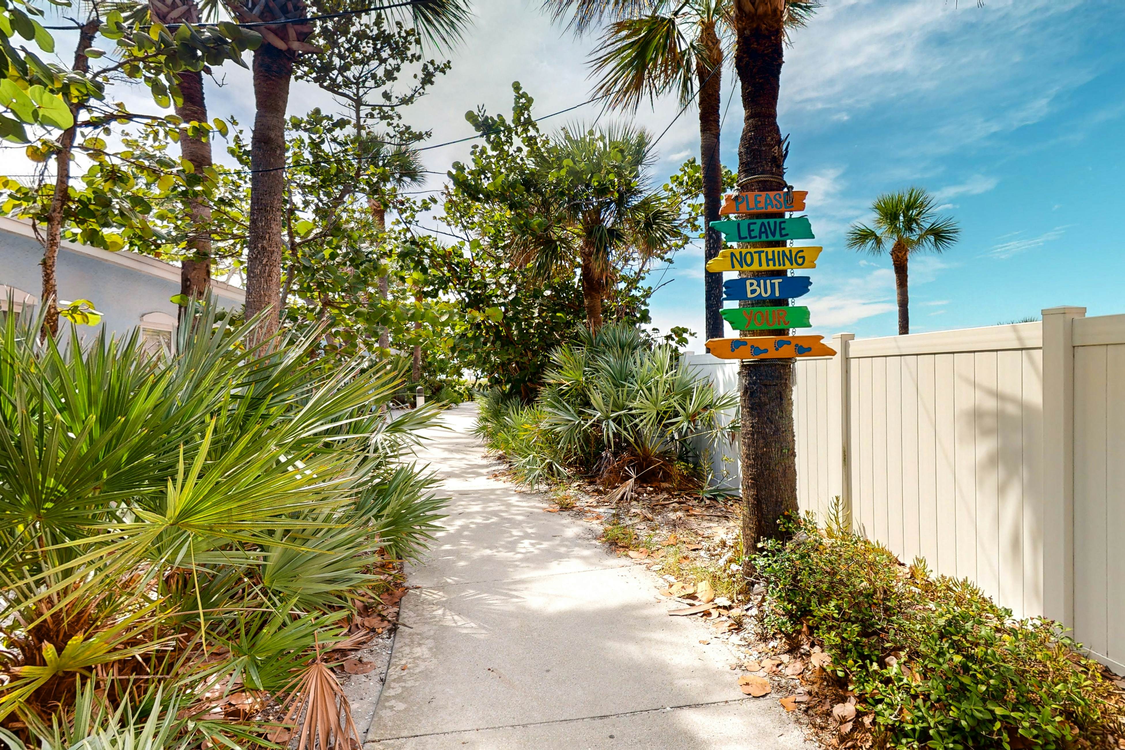 Dog-friendly beachfront condo with pool, hot tub, tennis & AC -snowbird-friendly