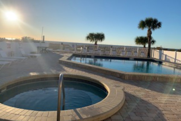Newly renovated top floor corner condo with Gulf front views pool and hot tub