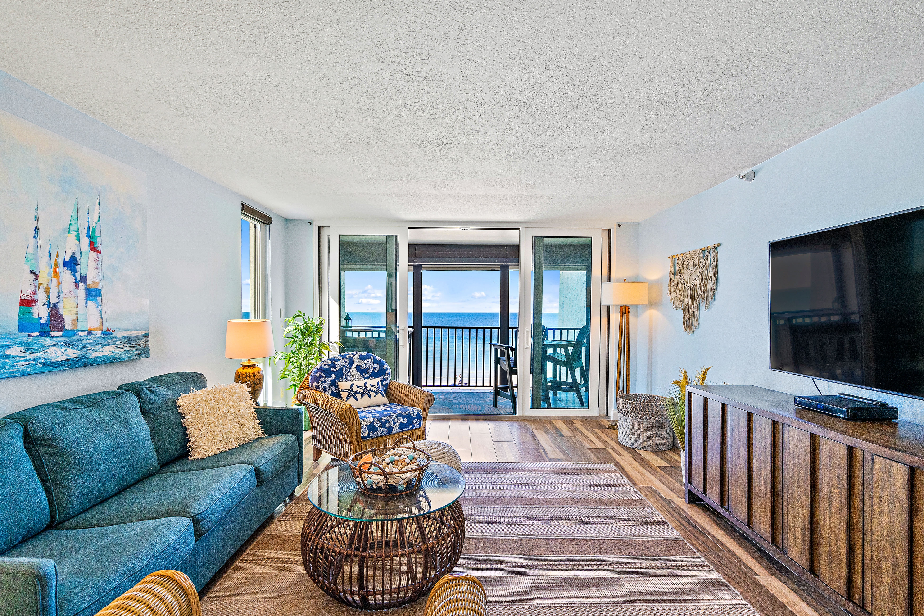 Gorgeous updated and spacious condo with stunning beachfront view pool WD and AC