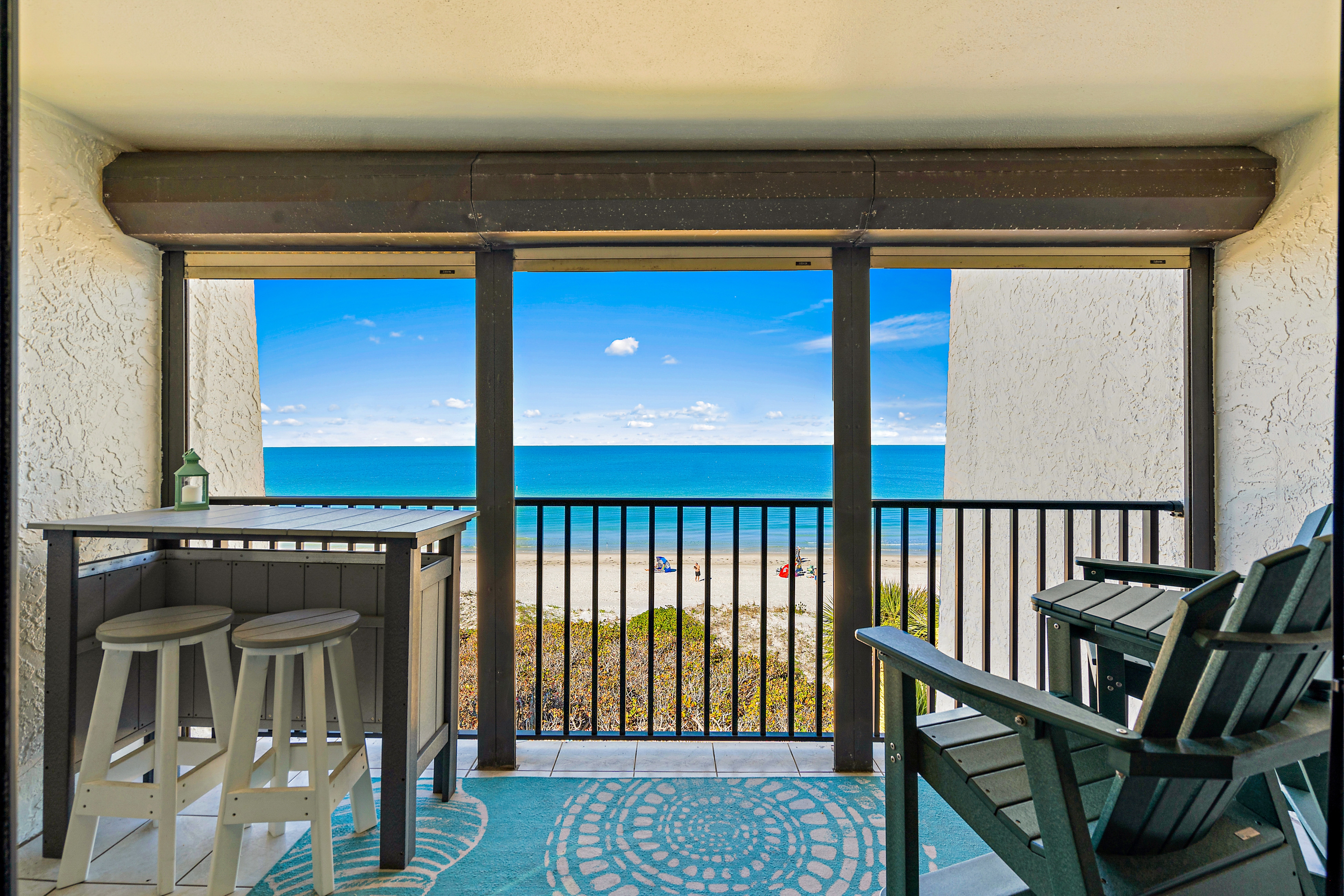 Gorgeous updated and spacious condo with stunning beachfront view pool WD and AC