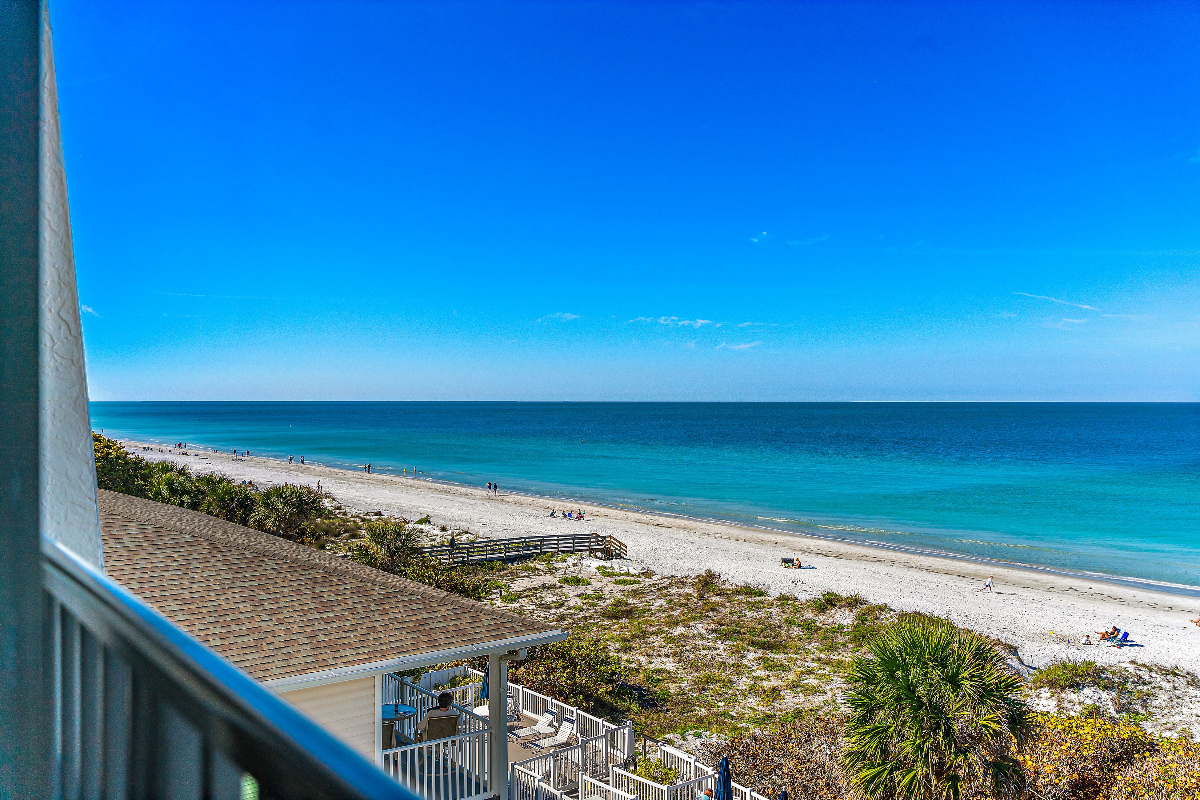 Gorgeous updated and spacious condo with stunning beachfront view pool WD and AC