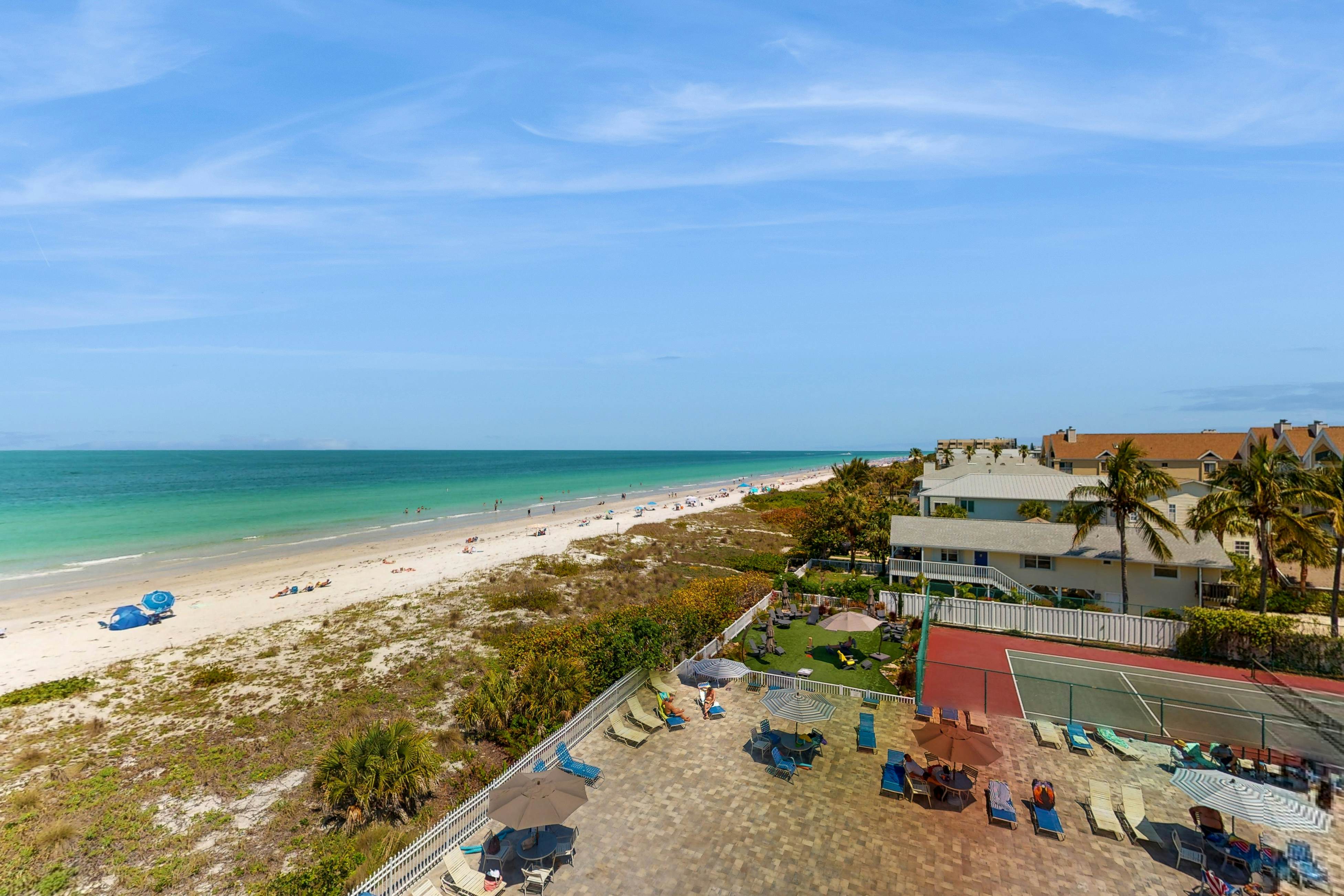 Gulf-front corner condo with pool, hot tub & easy beach access