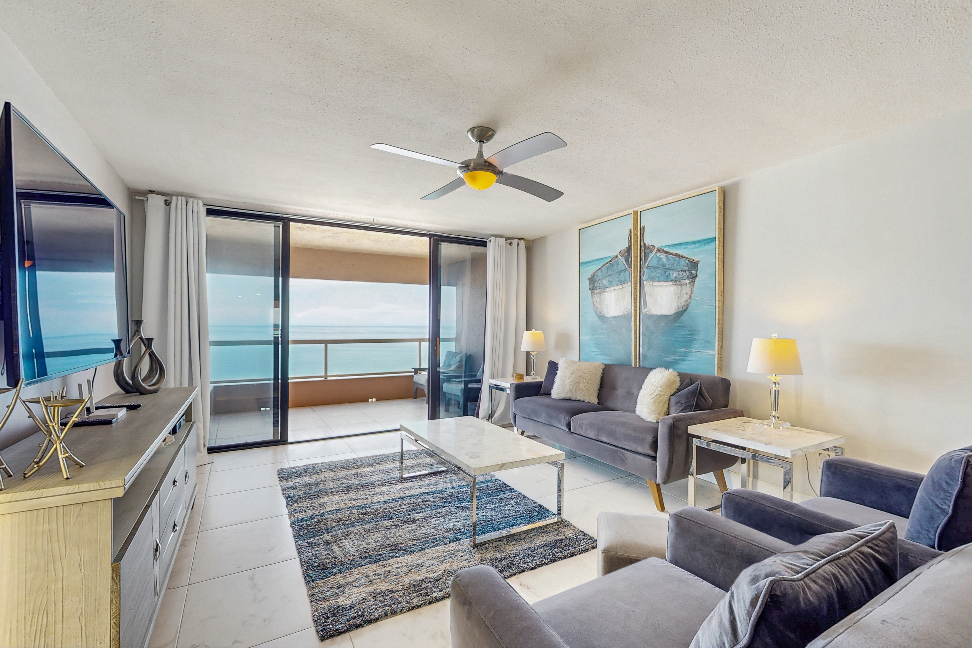 12th floor beachfront condo with balcony heated pool gym pool spa and tennis