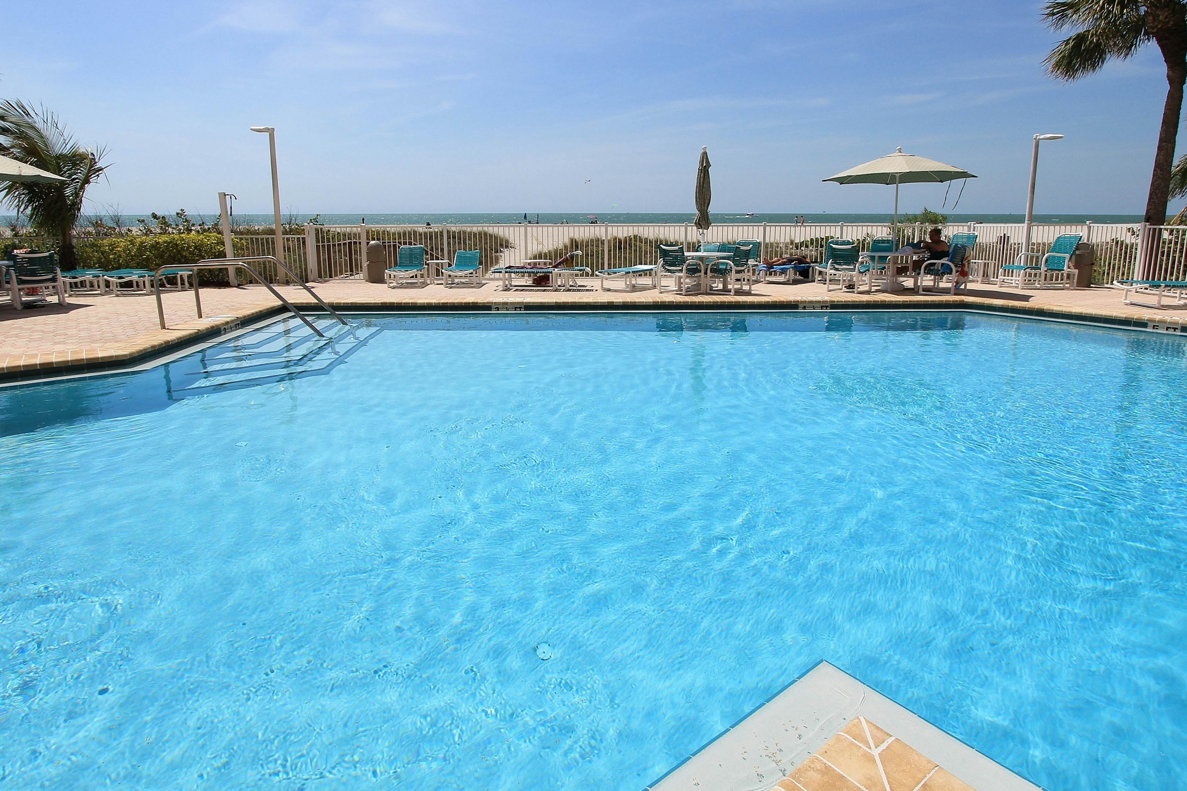 12th-floor beachfront condo with balcony, heated pool, gym, pool spa & tennis