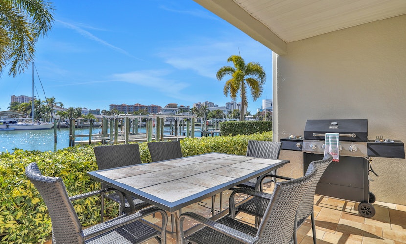 Beautiful 3 level bayfront home amazing views dock and community pool