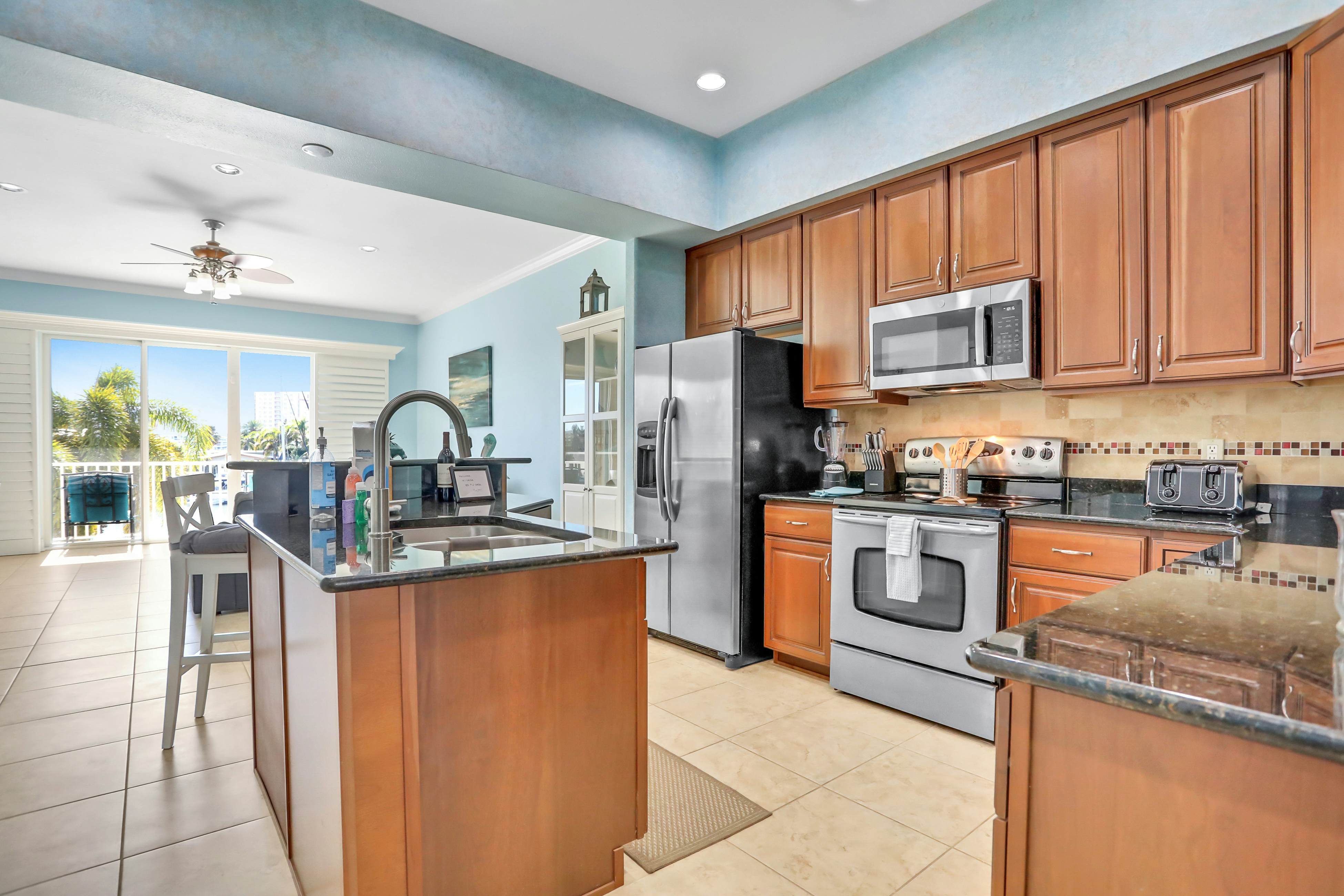 Beautiful 3-level bayfront home amazing views, dock & community pool