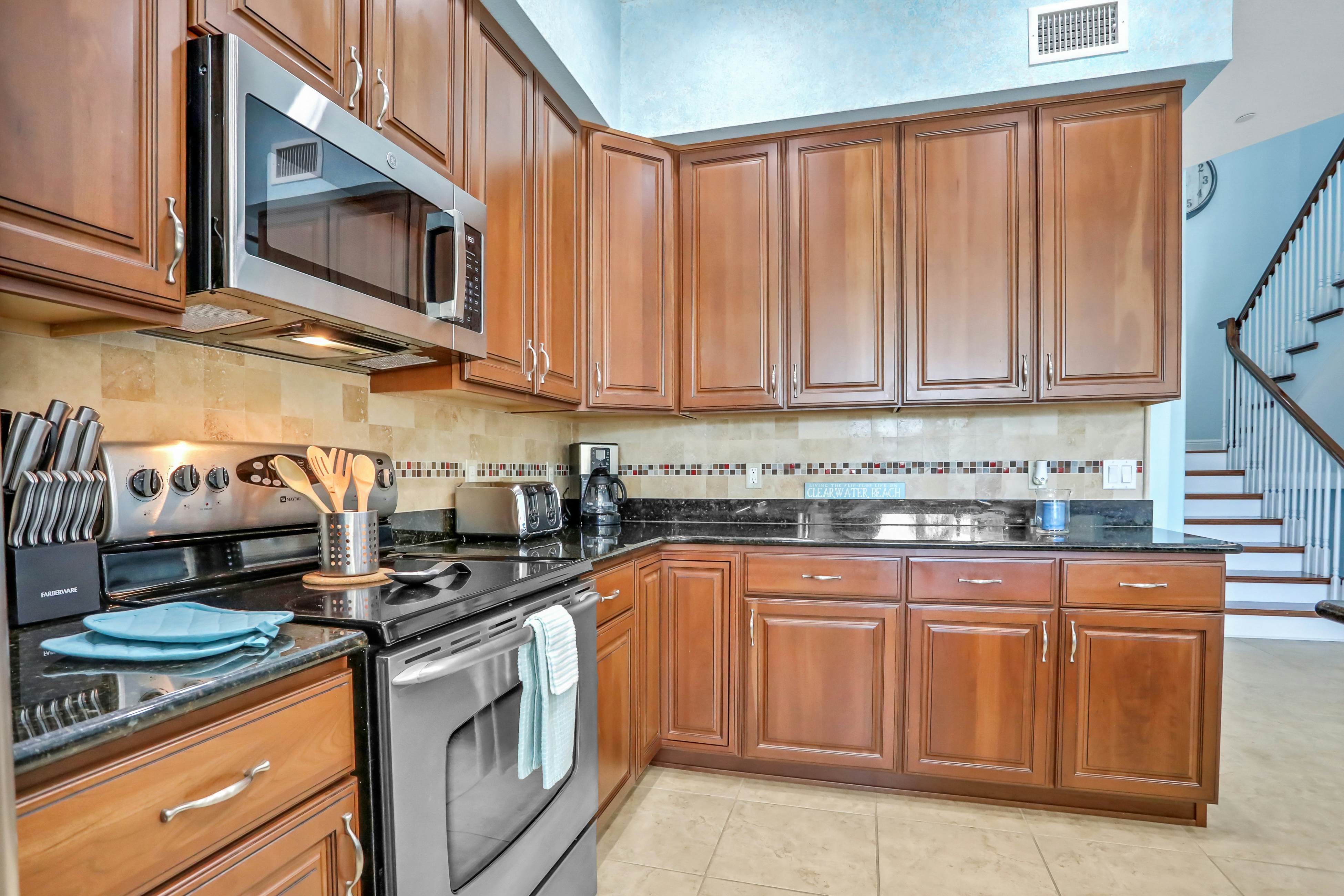 Beautiful 3-level bayfront home amazing views, dock & community pool