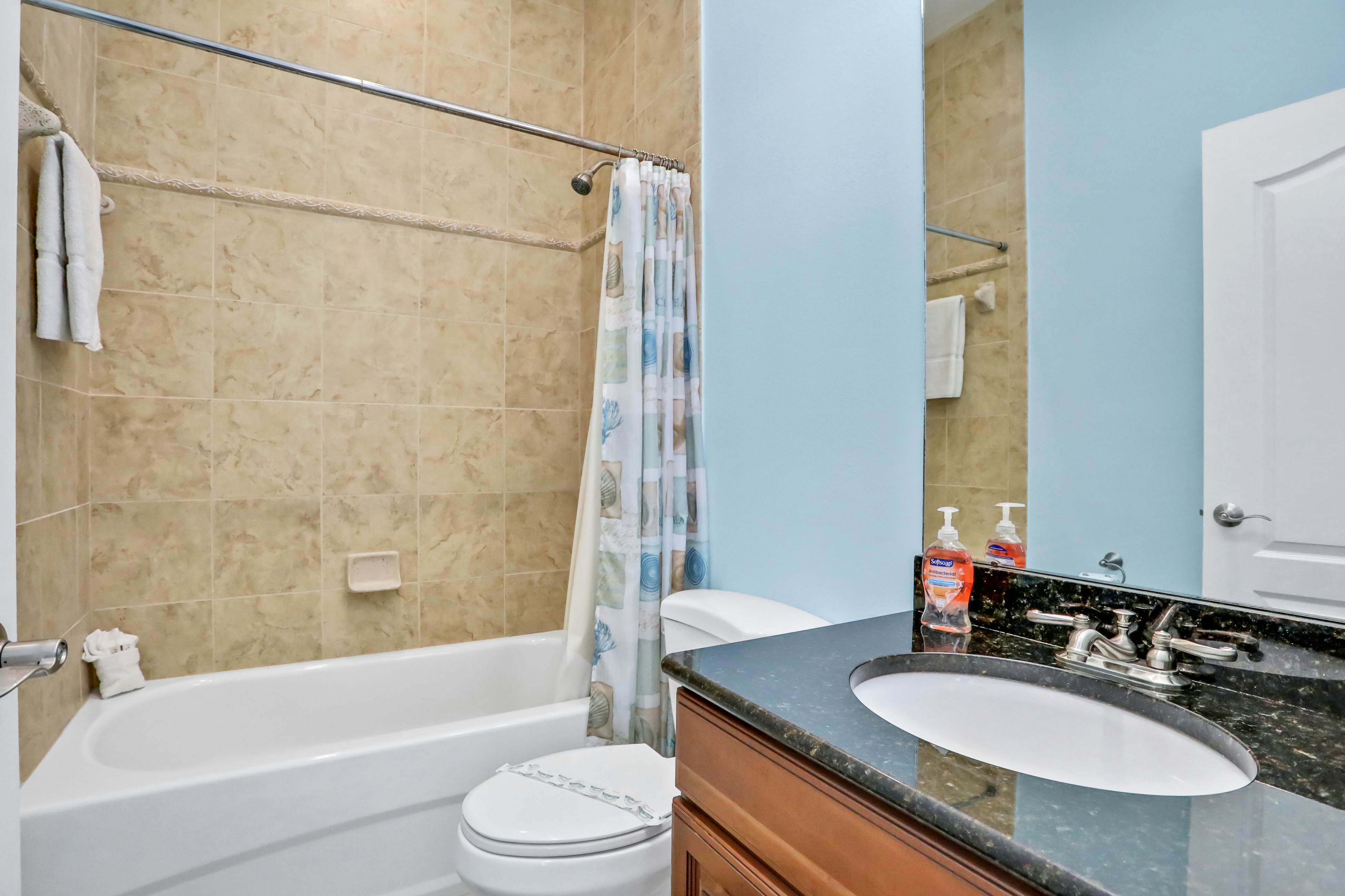 Beautiful 3-level bayfront home amazing views, dock & community pool