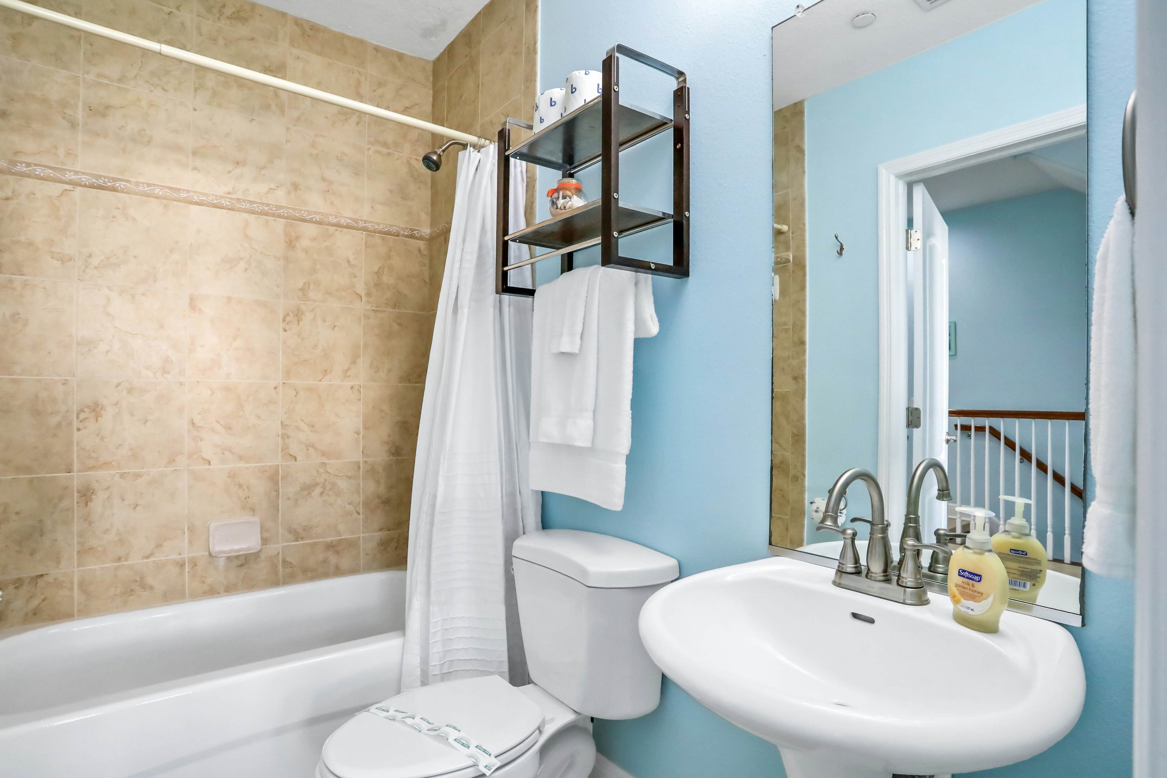 Beautiful 3-level bayfront home amazing views, dock & community pool