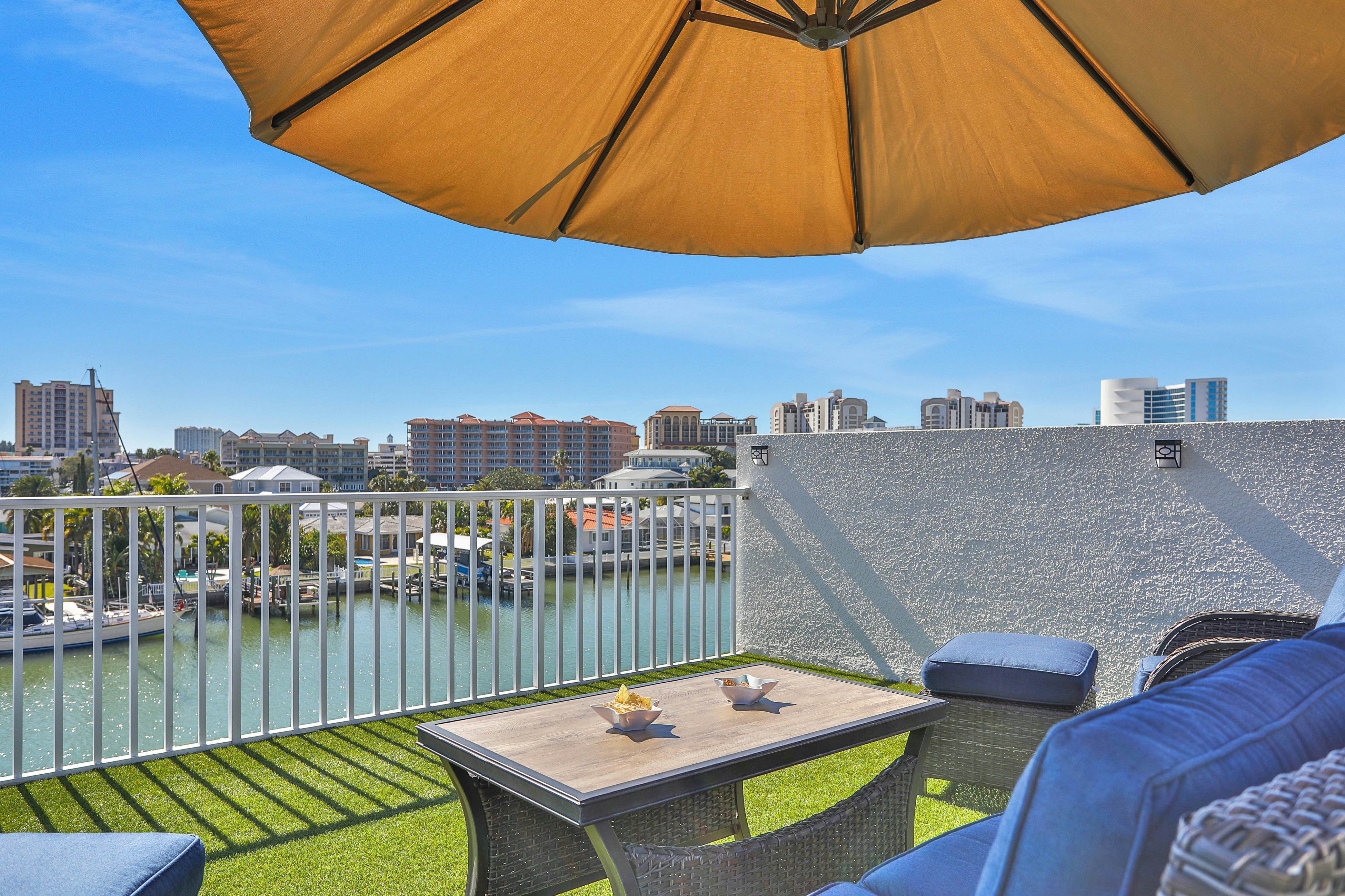 Beautiful 3-level bayfront home amazing views, dock & community pool