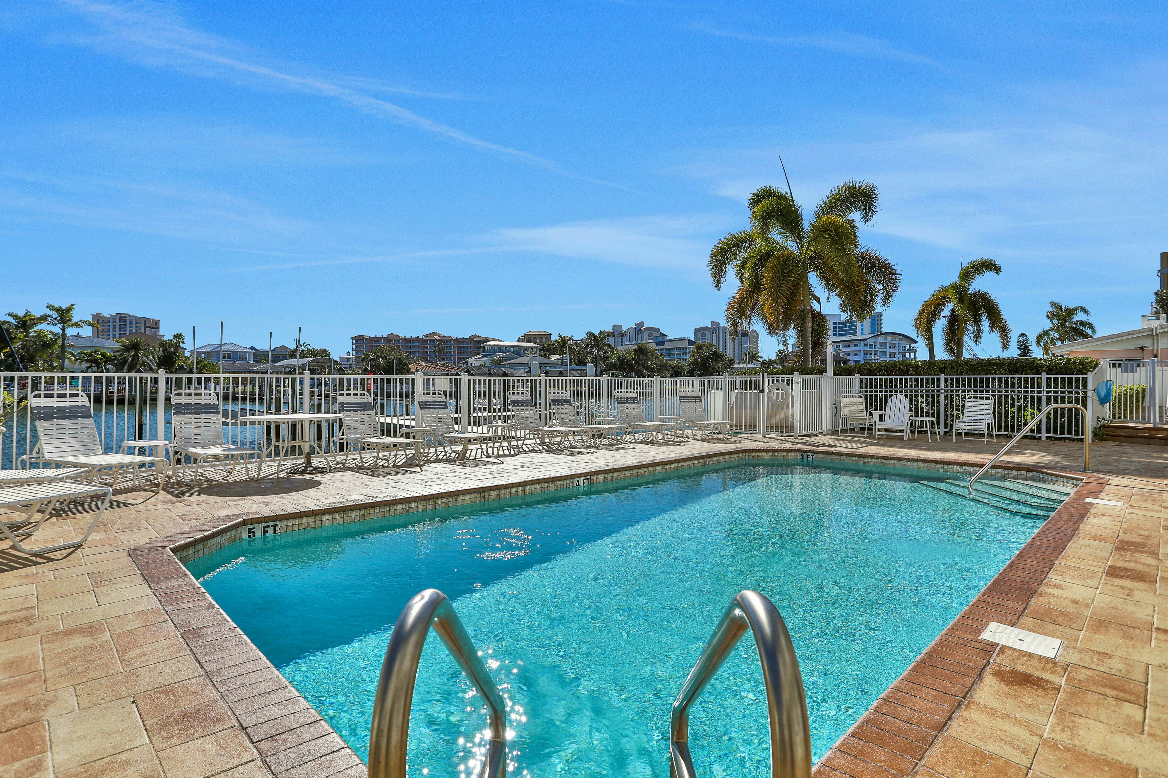 Beautiful 3-level bayfront home amazing views, dock & community pool