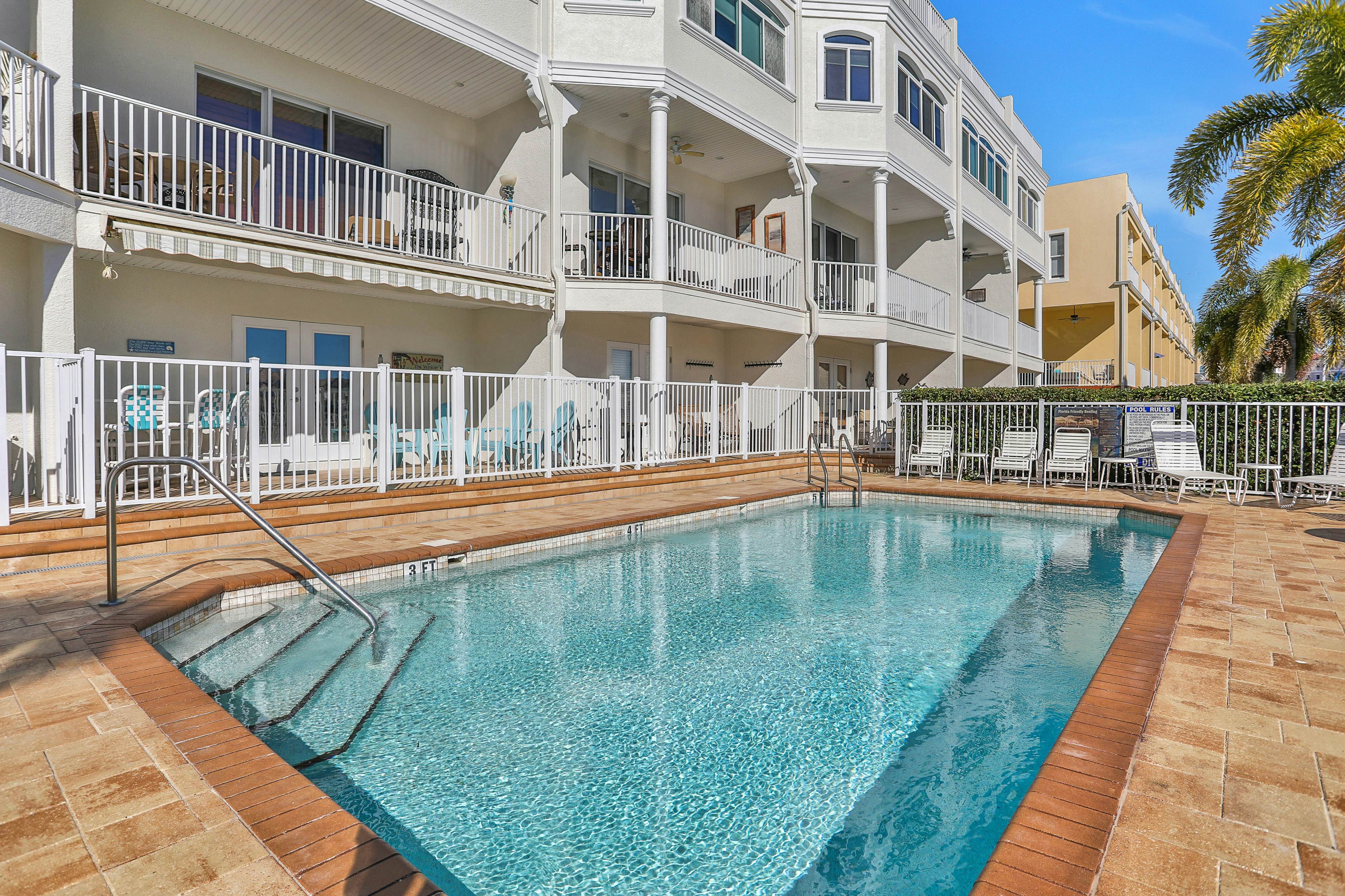 Beautiful 3-level bayfront home amazing views, dock & community pool