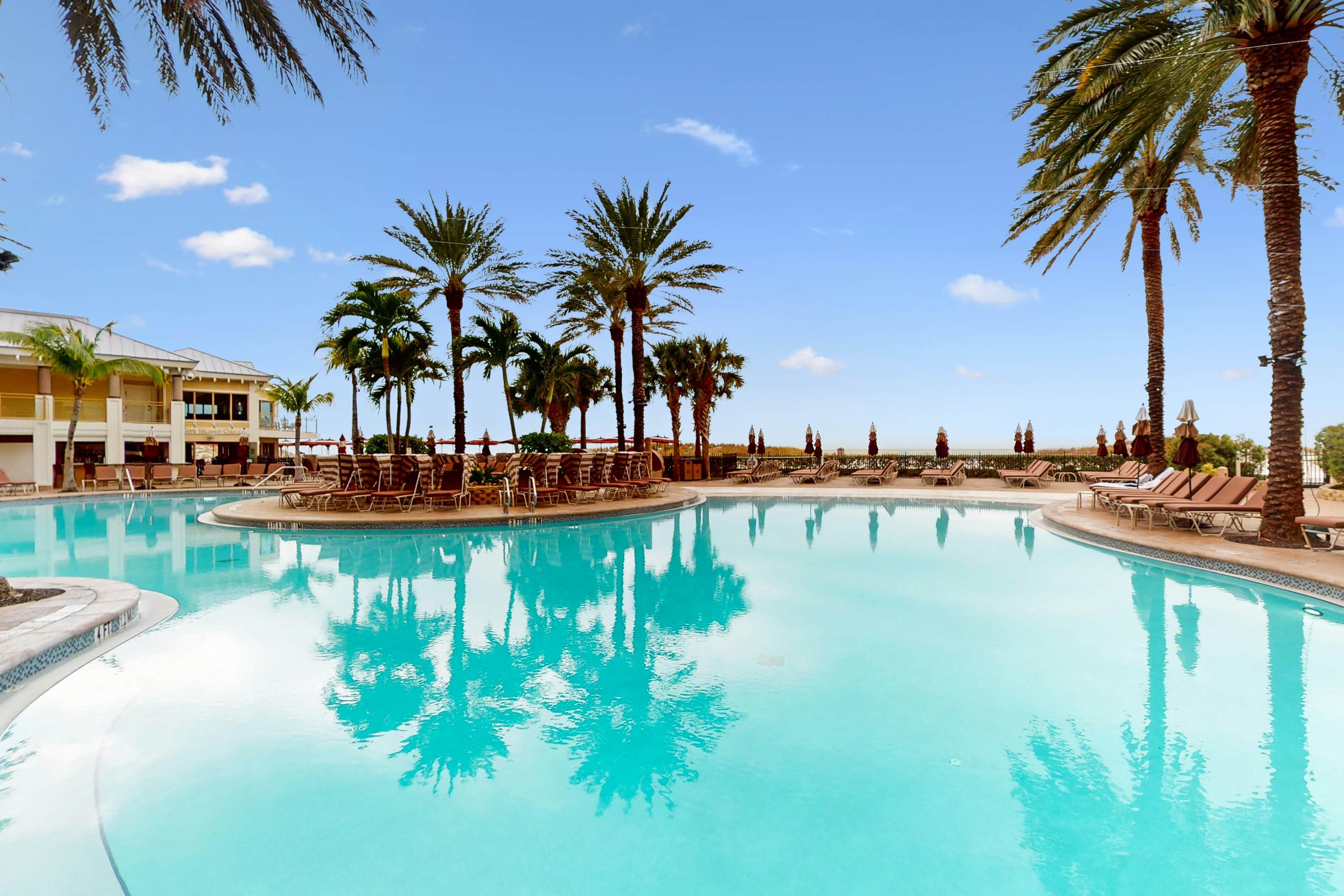 City View condo with beach access, pools, hot tub, gym, AC, & W/D