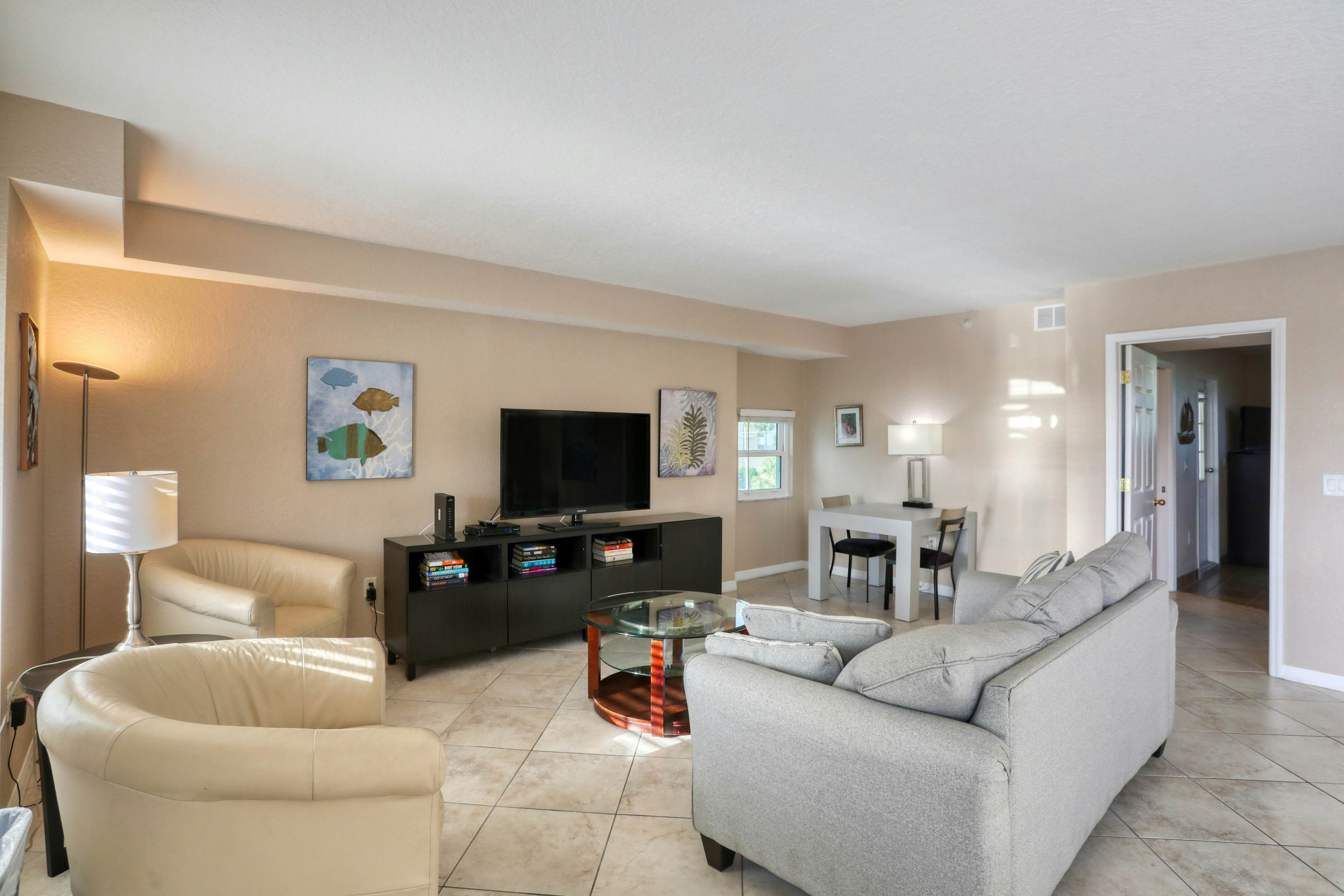 Third-floor condo with pool access, fast WiFi, central AC, & W/D - snowbirds OK