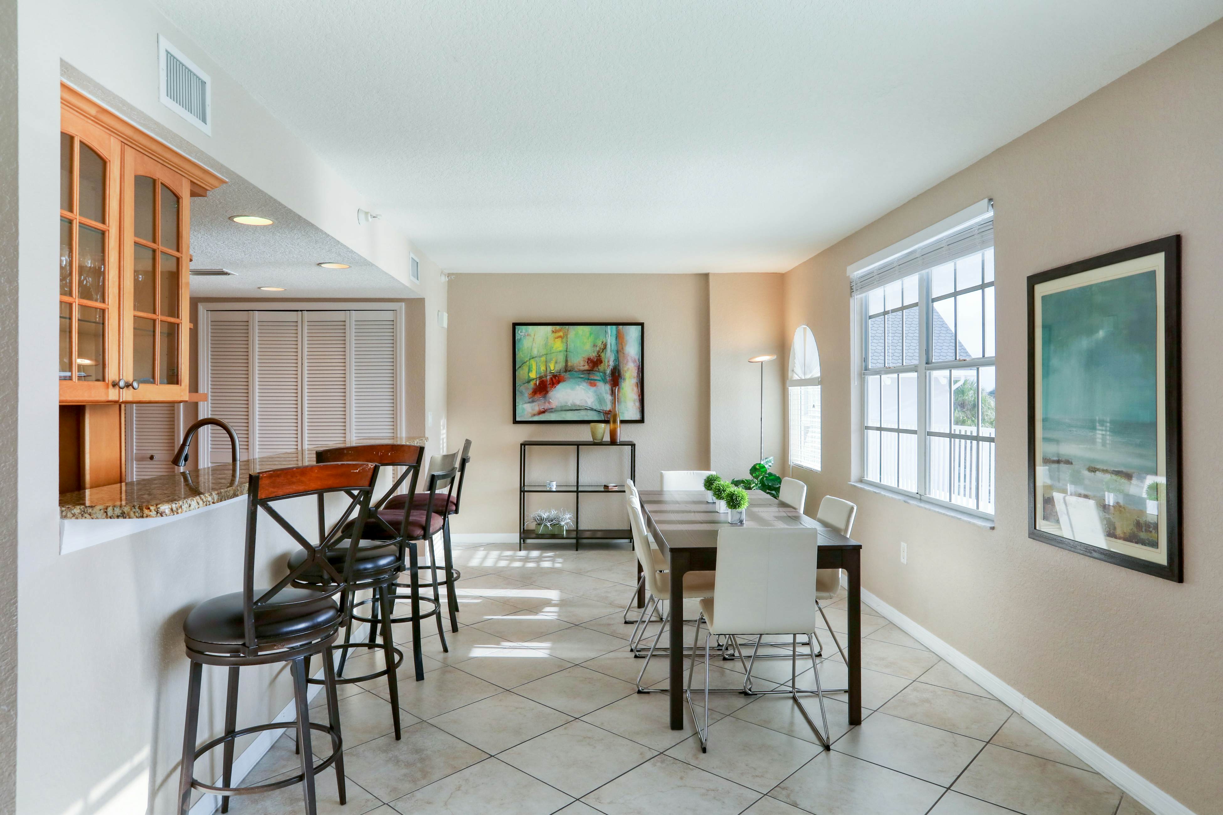 Third-floor condo with pool access, fast WiFi, central AC, & W/D - snowbirds OK