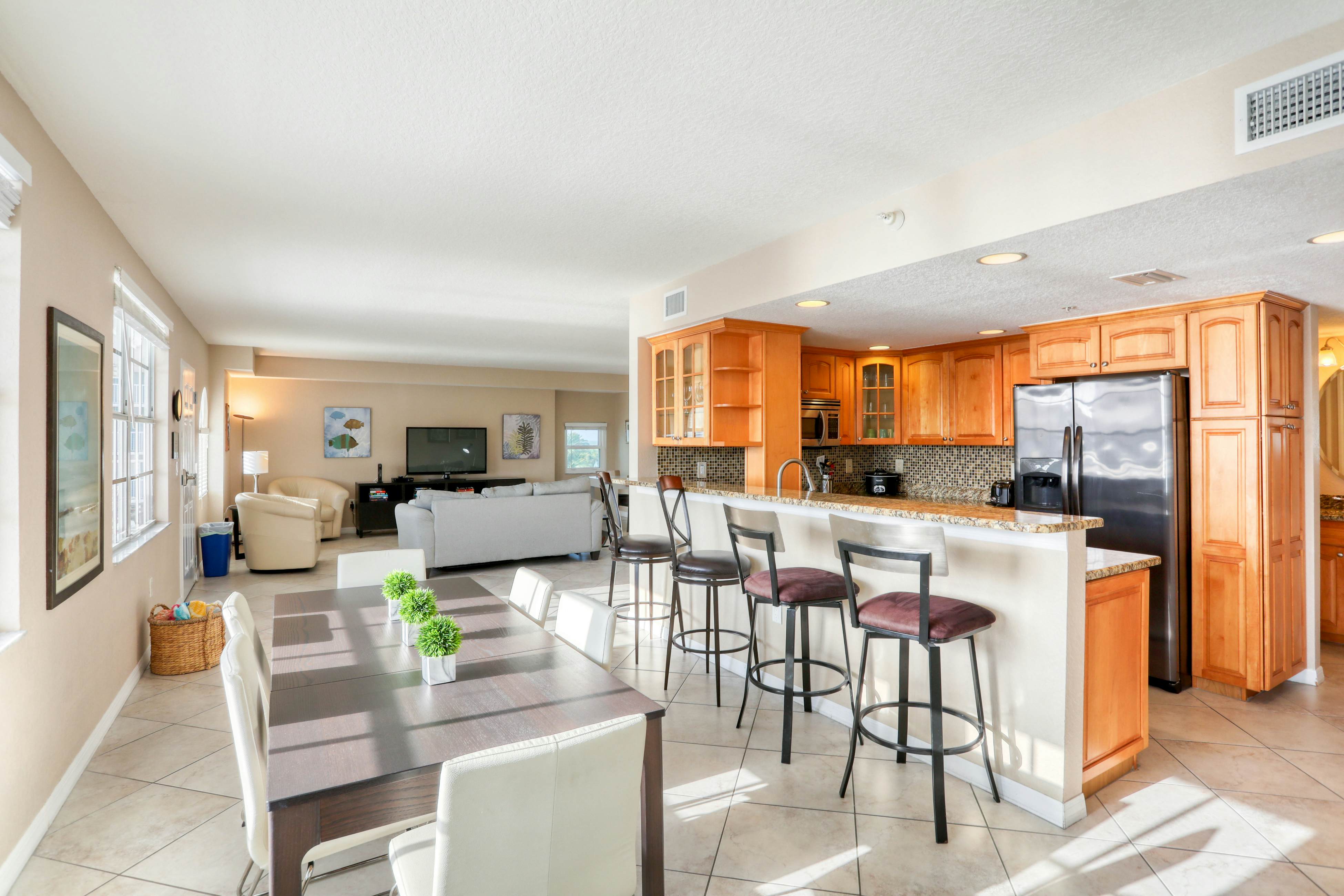 Third-floor condo with pool access, fast WiFi, central AC, & W/D - snowbirds OK