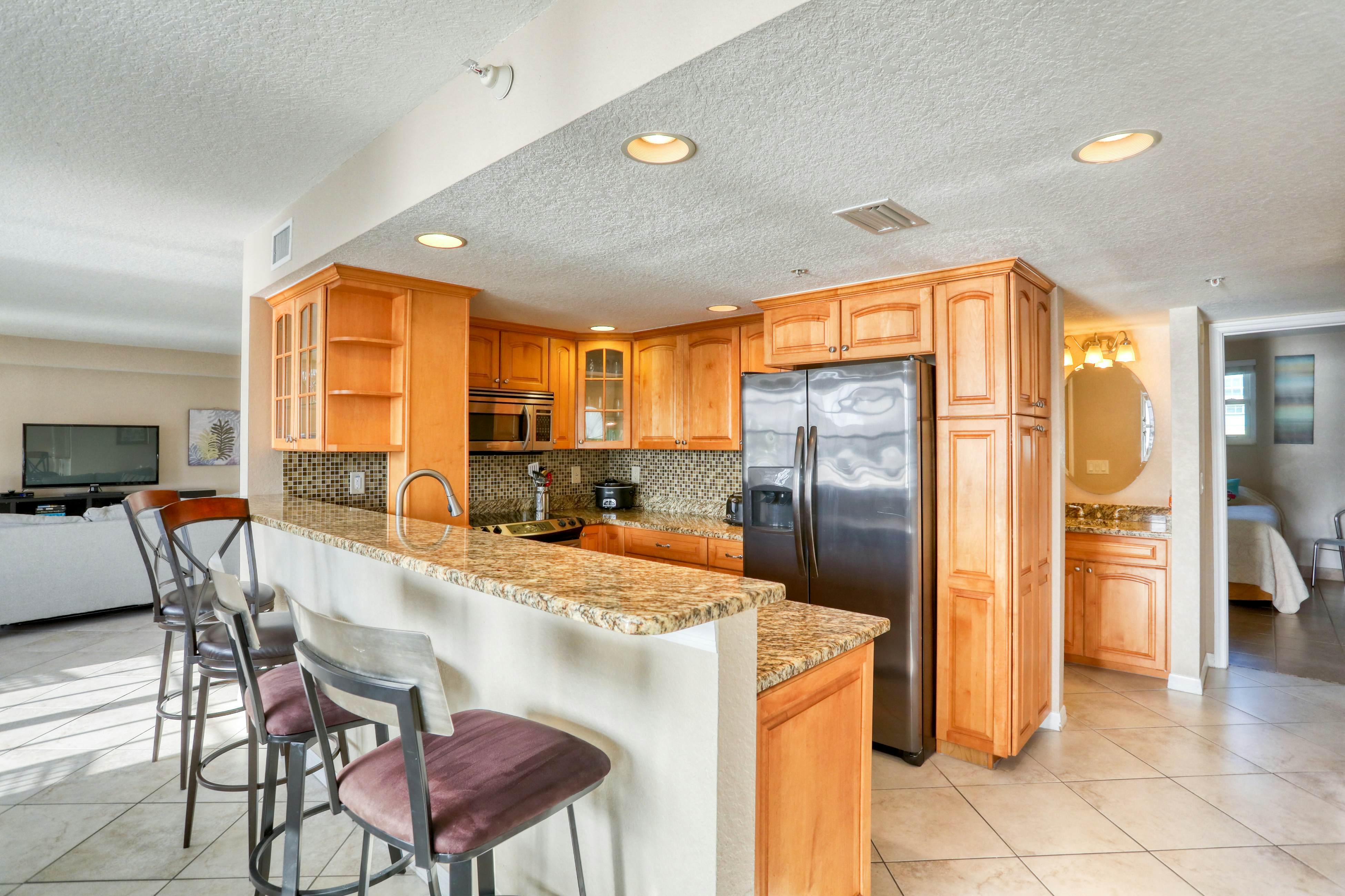 Third-floor condo with pool access, fast WiFi, central AC, & W/D - snowbirds OK
