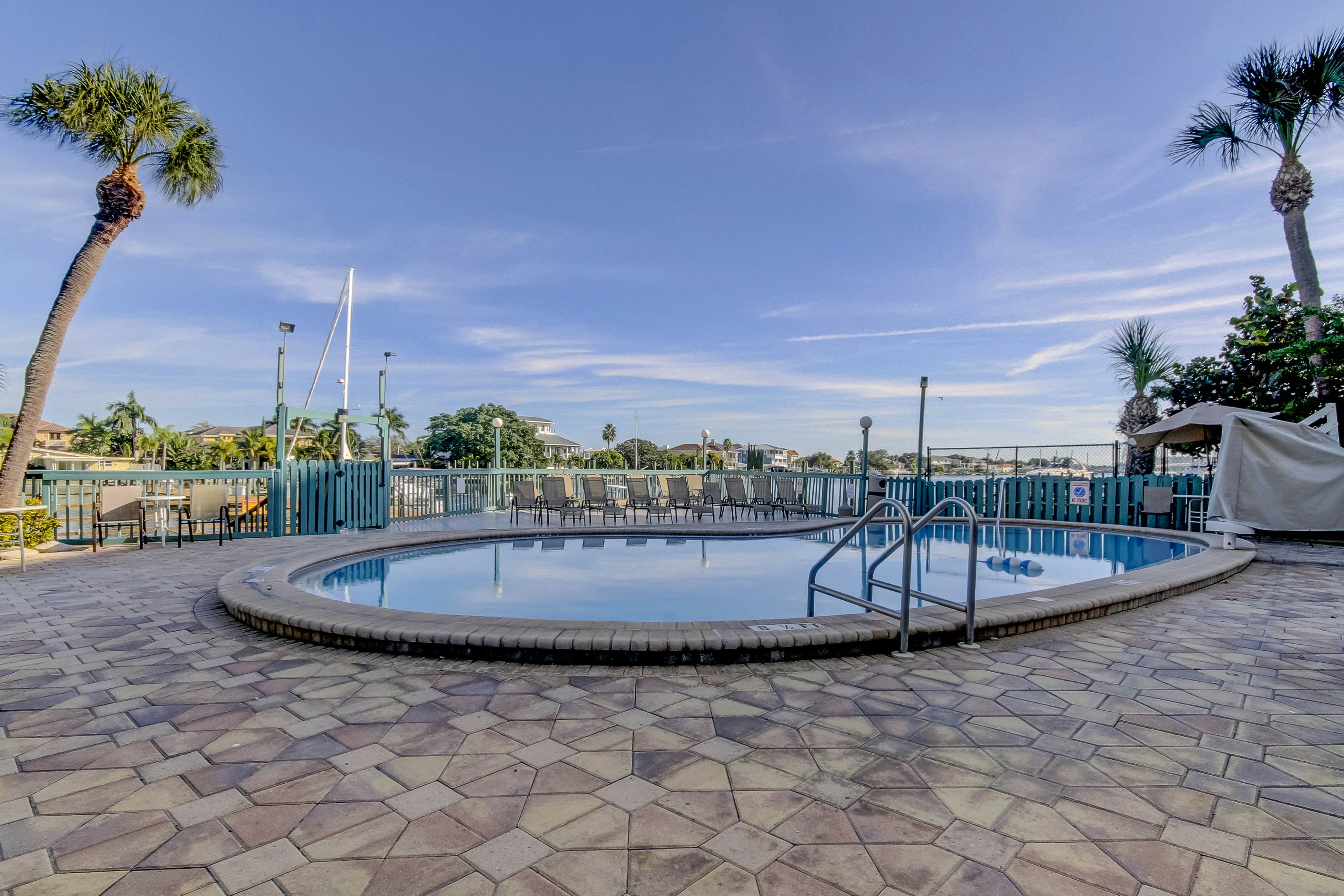 Third-floor condo with pool access, fast WiFi, central AC, & W/D - snowbirds OK