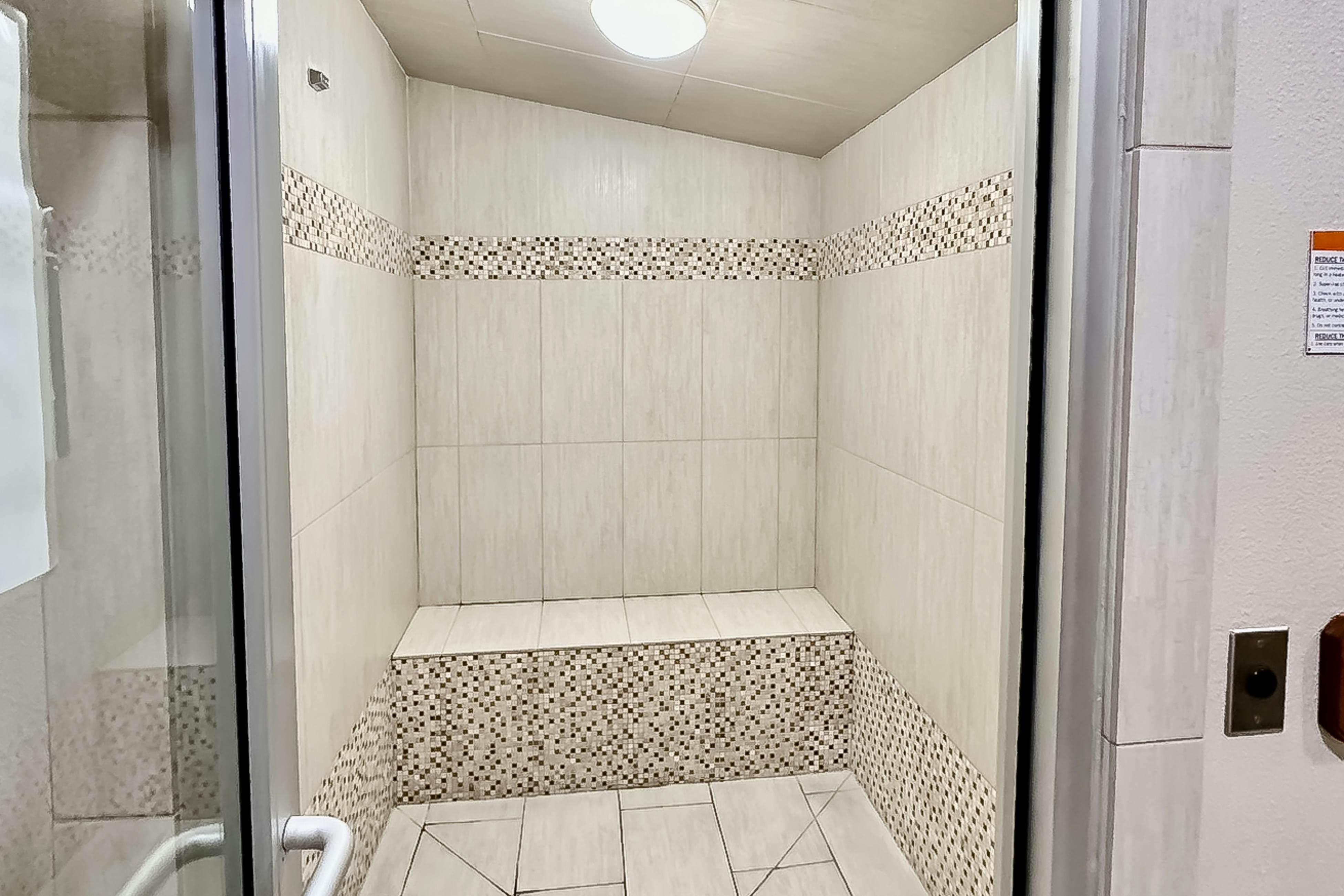 Exclusive Sandpearl Residences condo with Gulf views - heated pool, spa, grills