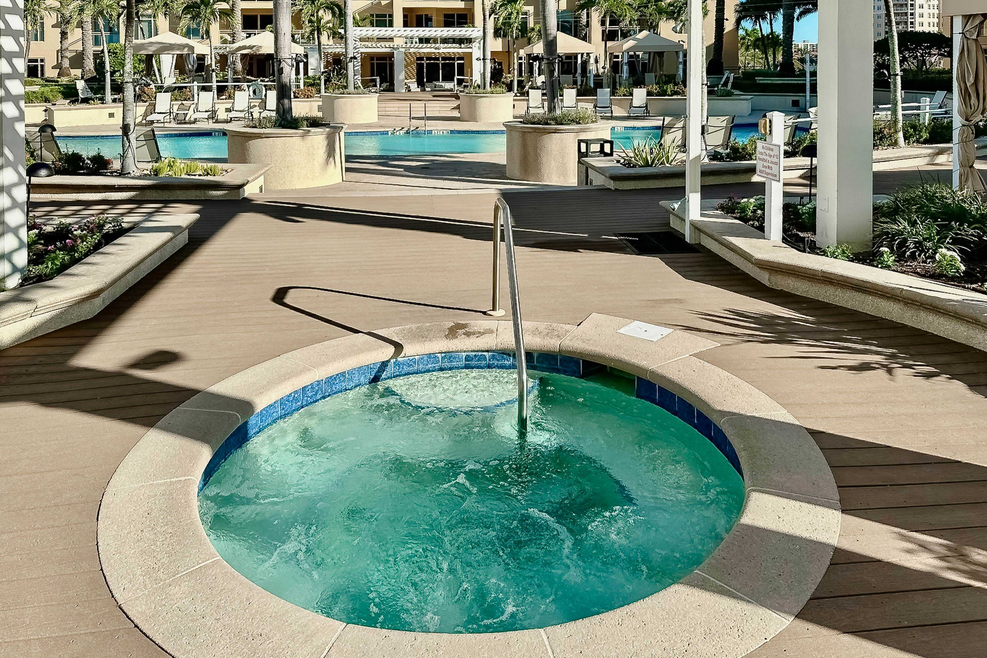 Exclusive Sandpearl Residences condo with Gulf views - heated pool, spa, grills