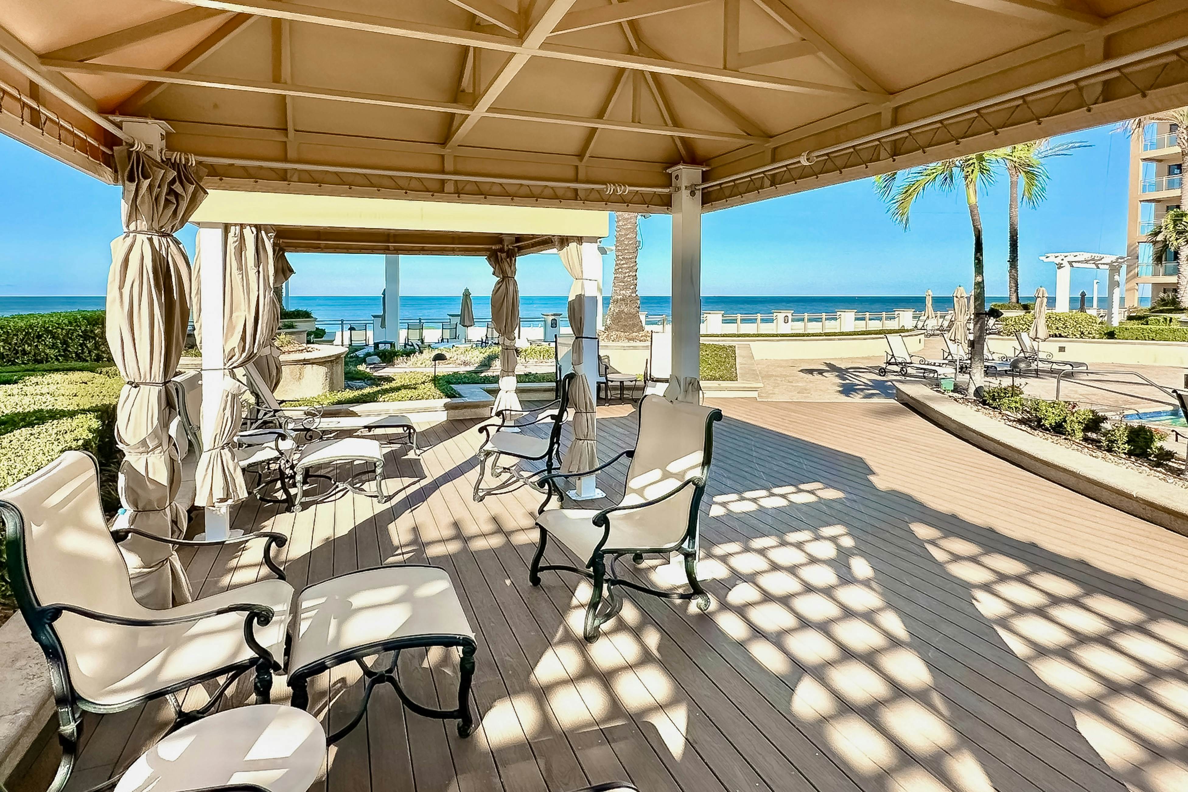 Exclusive Sandpearl Residences condo with Gulf views - heated pool, spa, grills