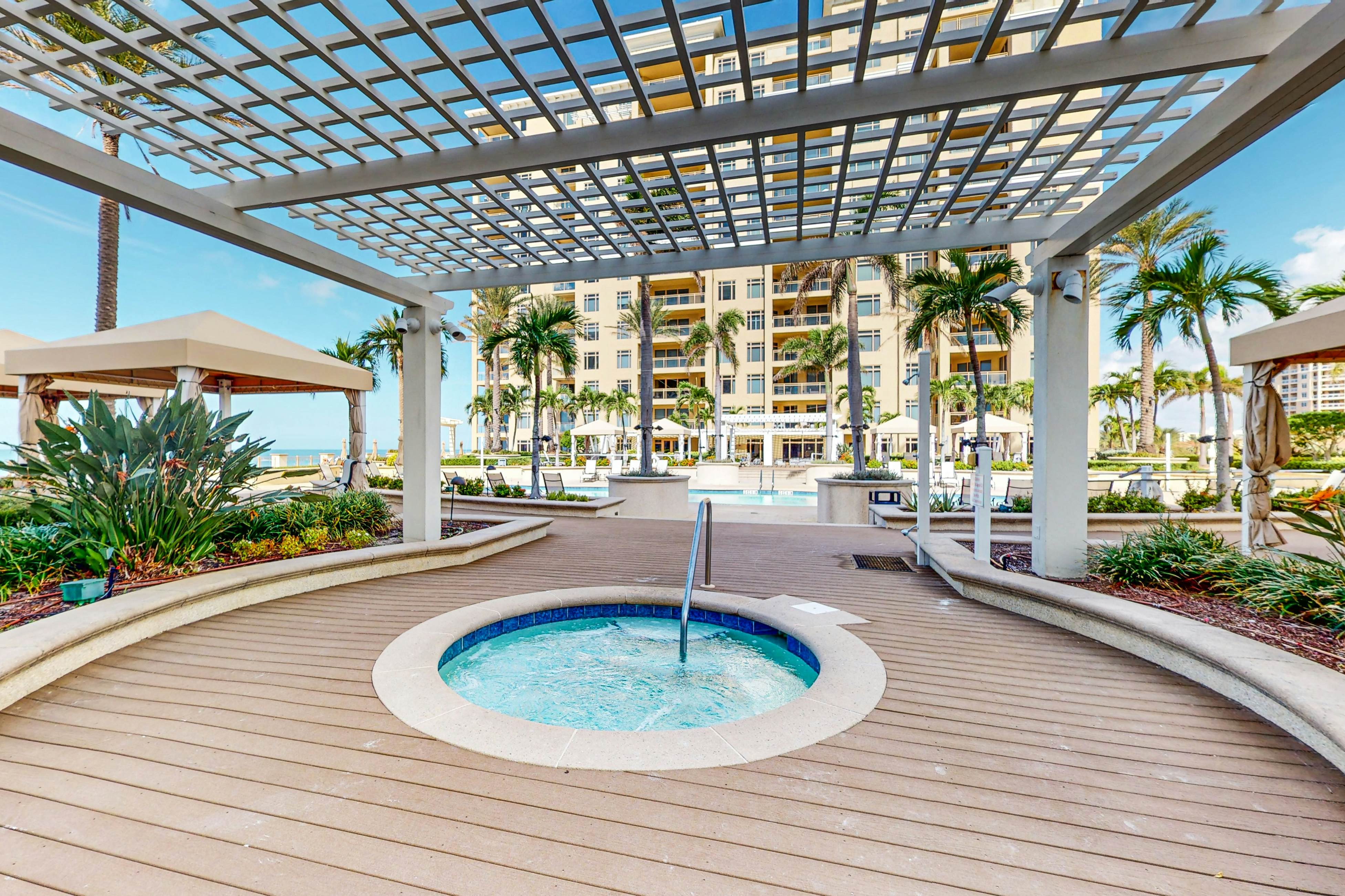 Exclusive Sandpearl Residences condo with Gulf views - heated pool, spa, grills