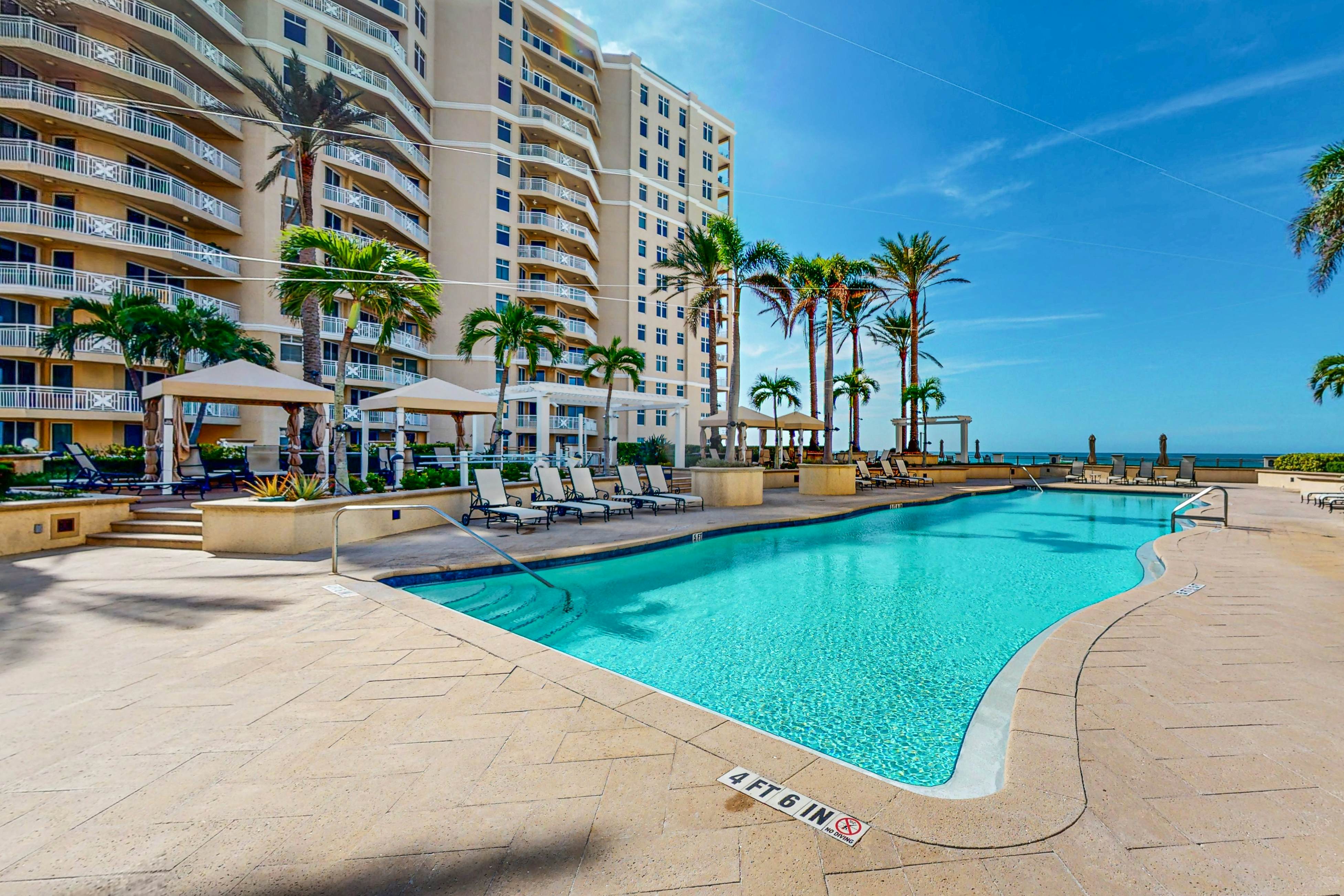 Exclusive Sandpearl Residences condo with Gulf views - heated pool, spa, grills