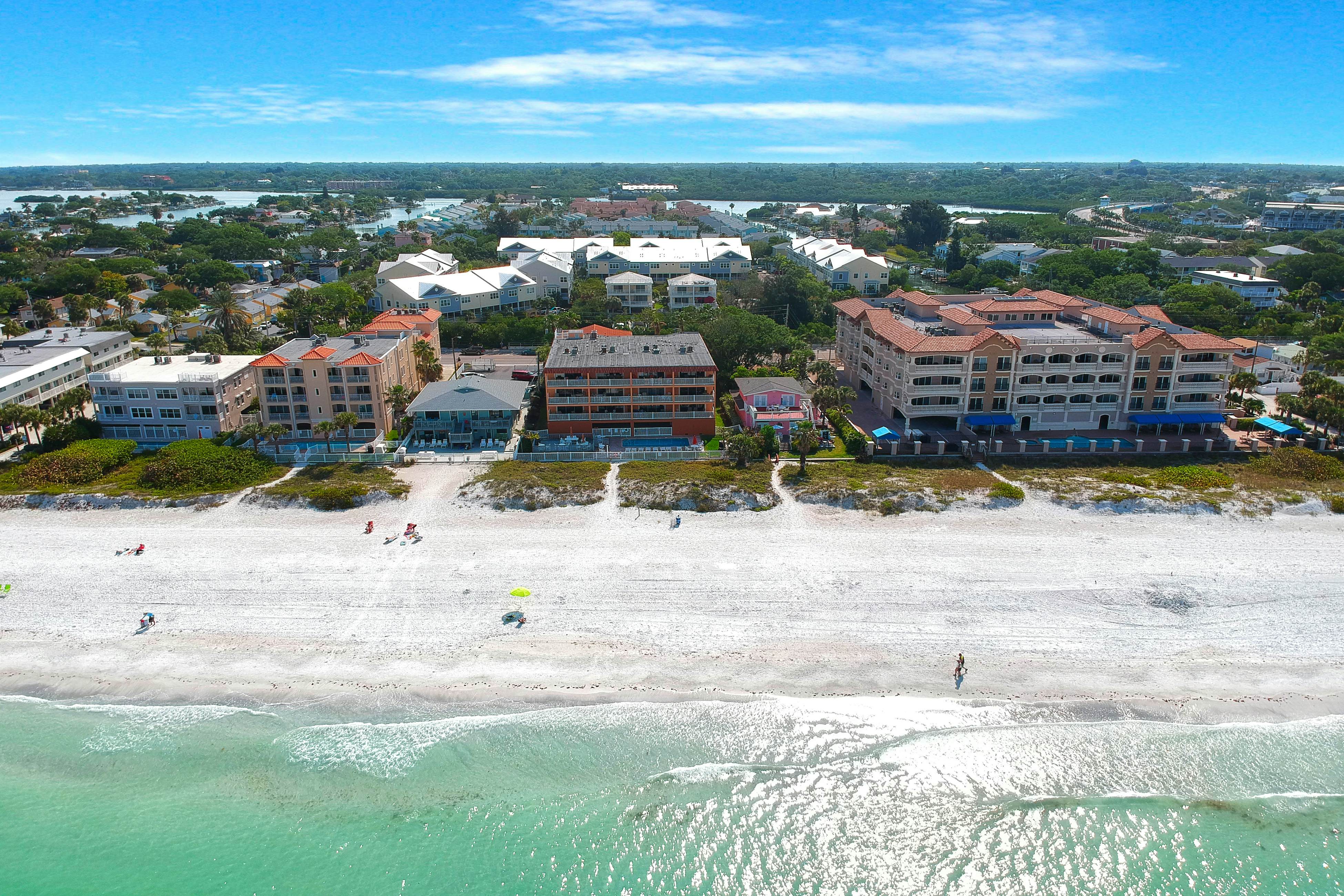 Oceanfront condo with WiFi, pool & views - walk to dining & attractions