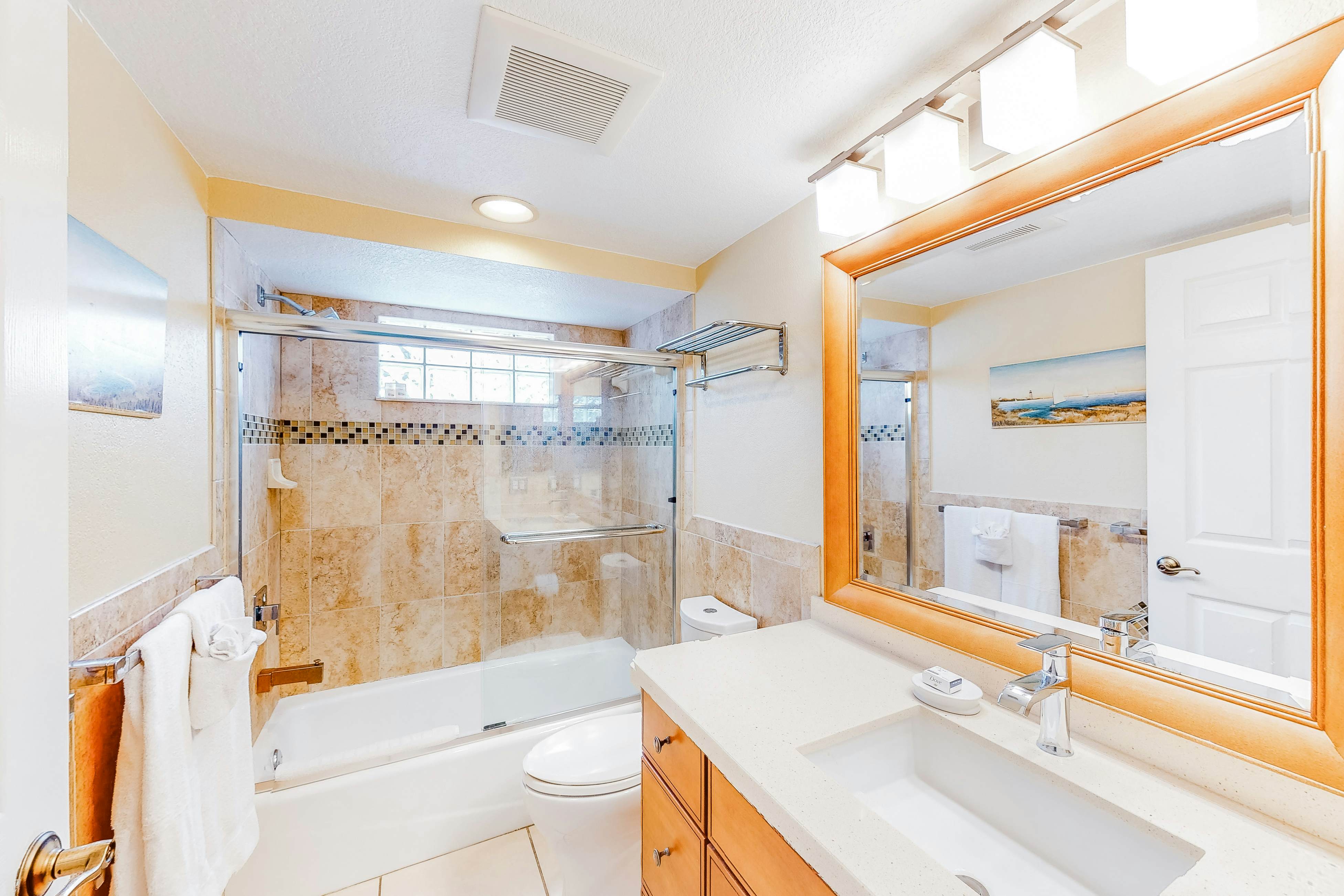 Oceanfront condo with WiFi, pool & views - walk to dining & attractions