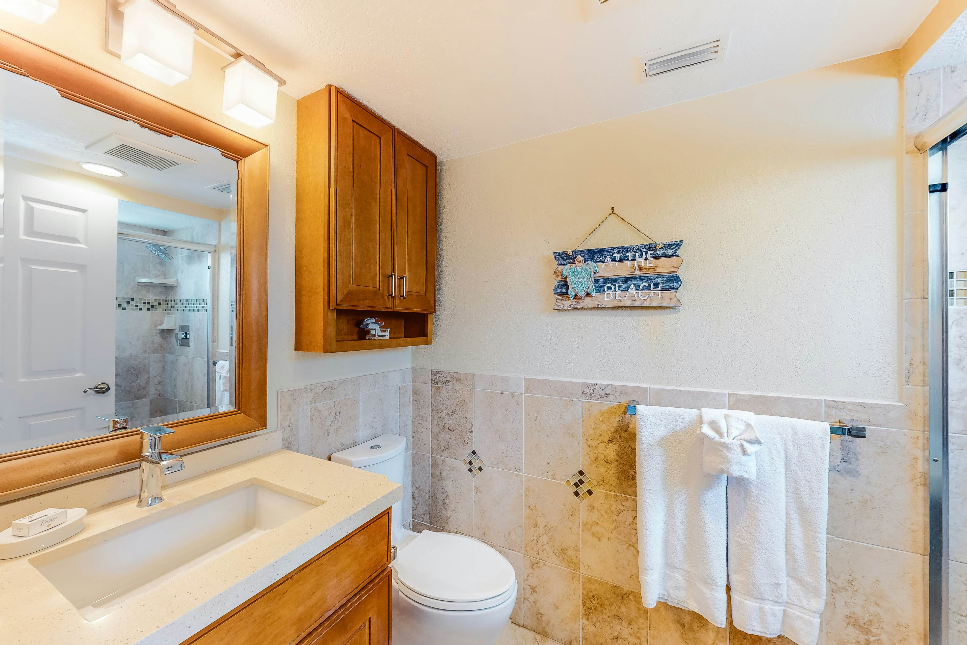 Oceanfront condo with WiFi, pool & views - walk to dining & attractions