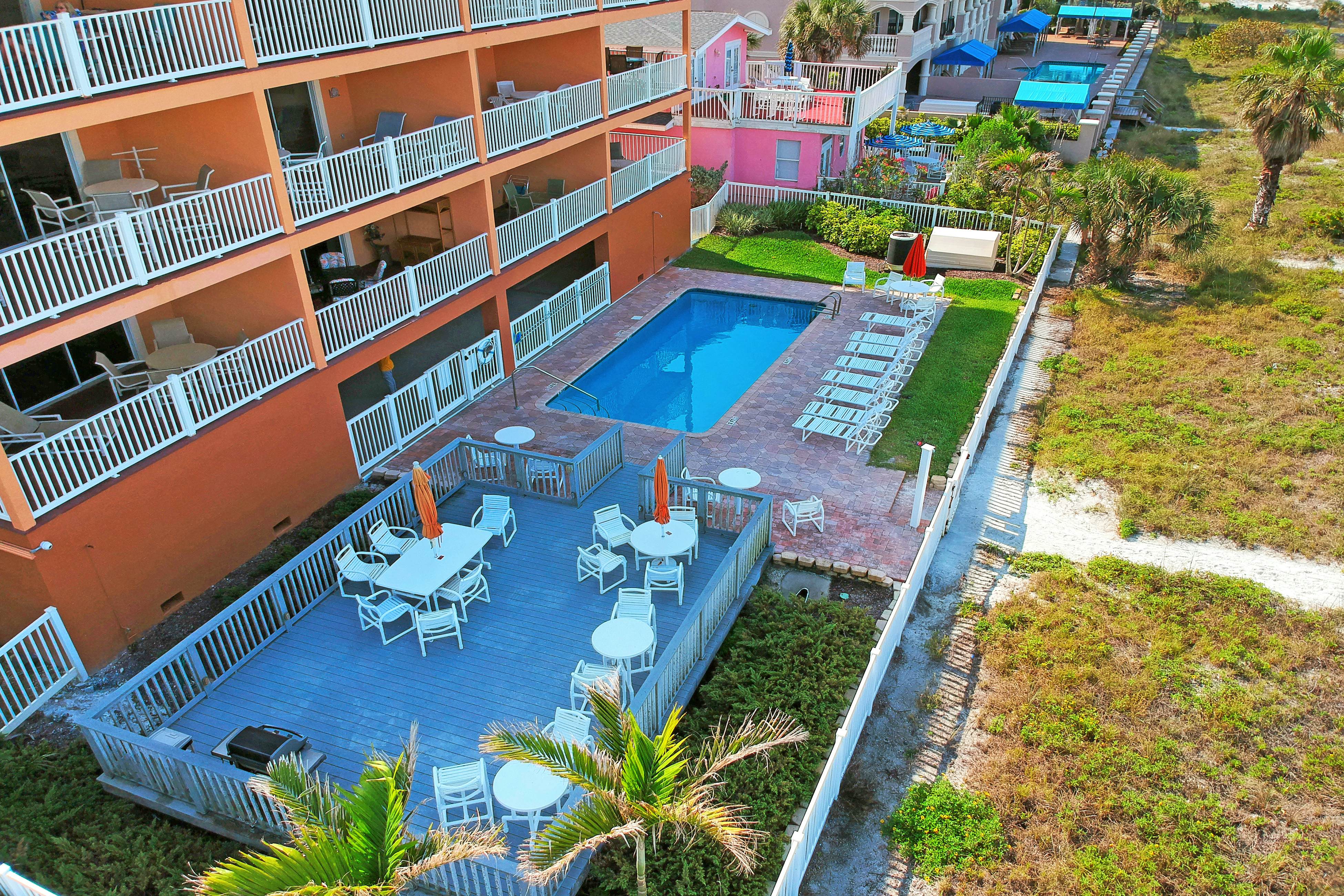 Oceanfront condo with WiFi, pool & views - walk to dining & attractions
