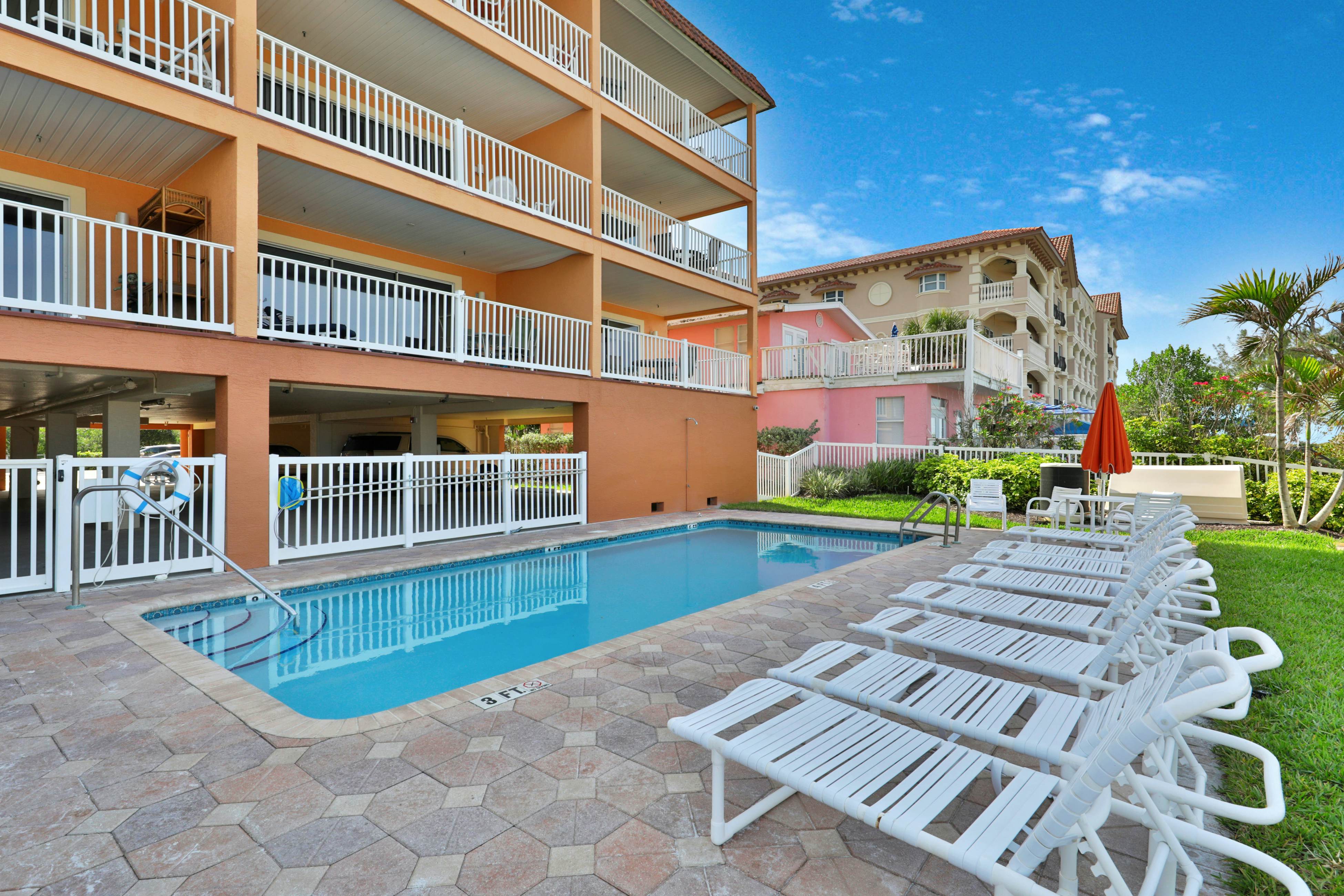 Oceanfront condo with WiFi, pool & views - walk to dining & attractions