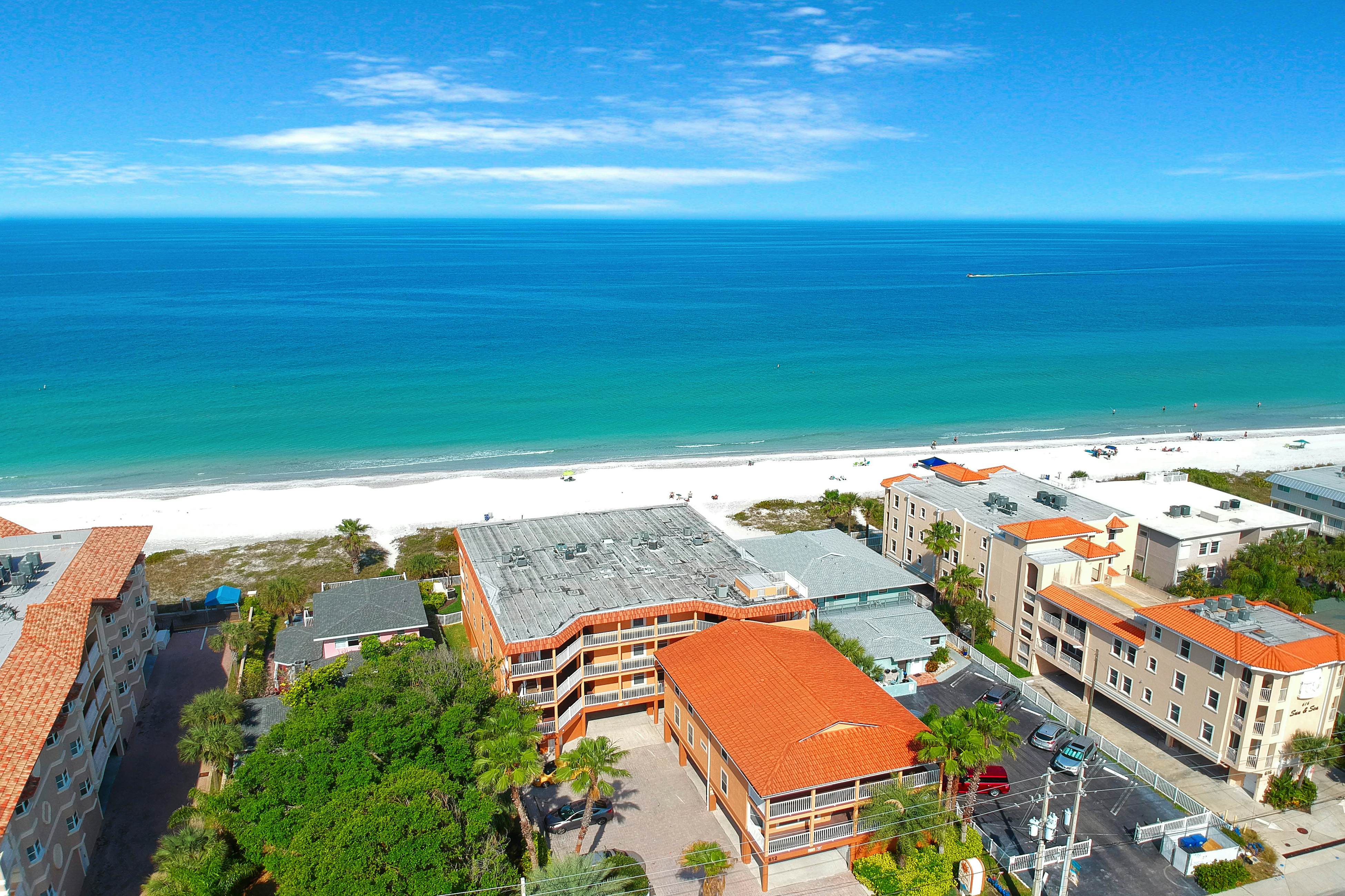 Oceanfront condo with WiFi, pool & views - walk to dining & attractions
