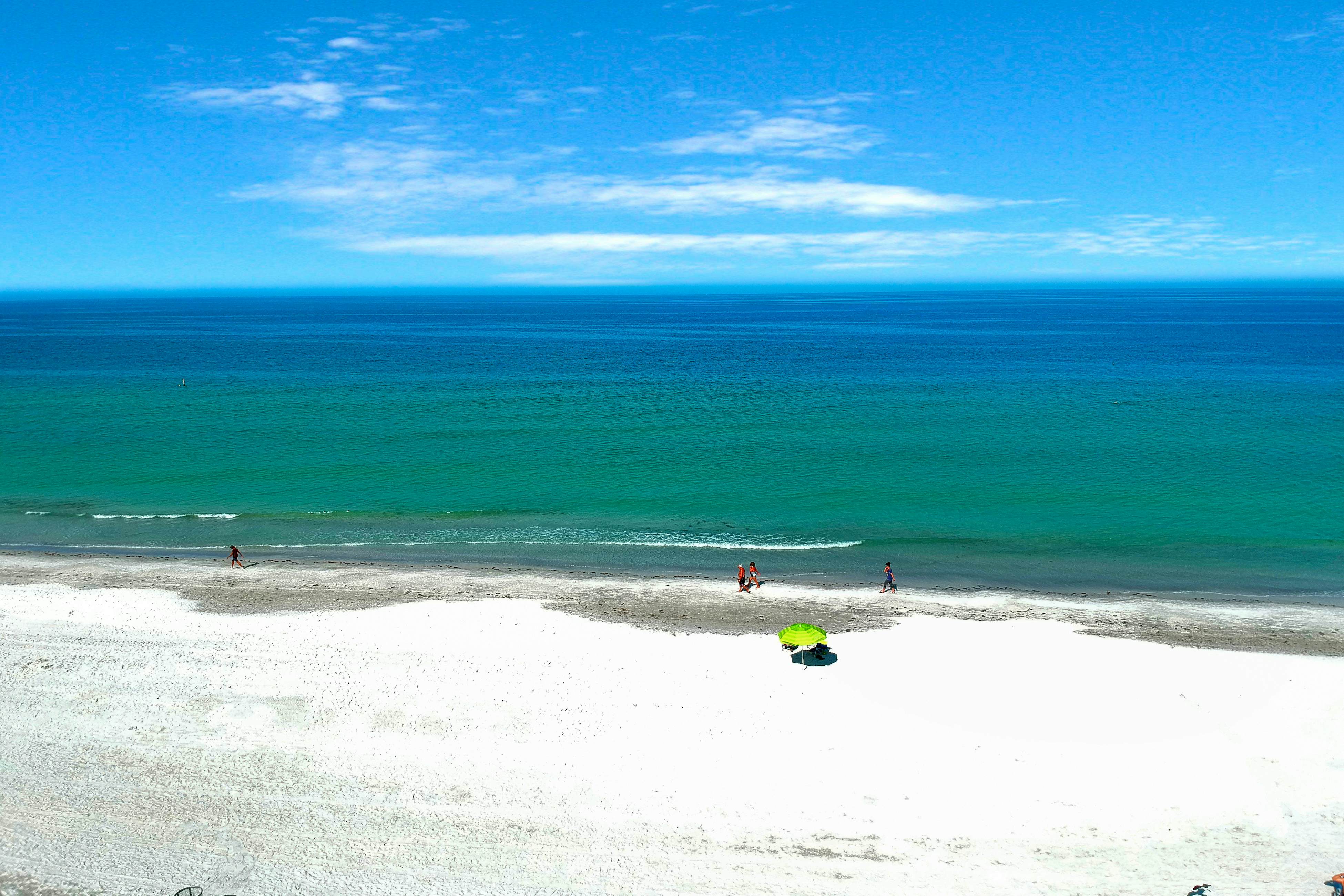 Oceanfront condo with WiFi, pool & views - walk to dining & attractions