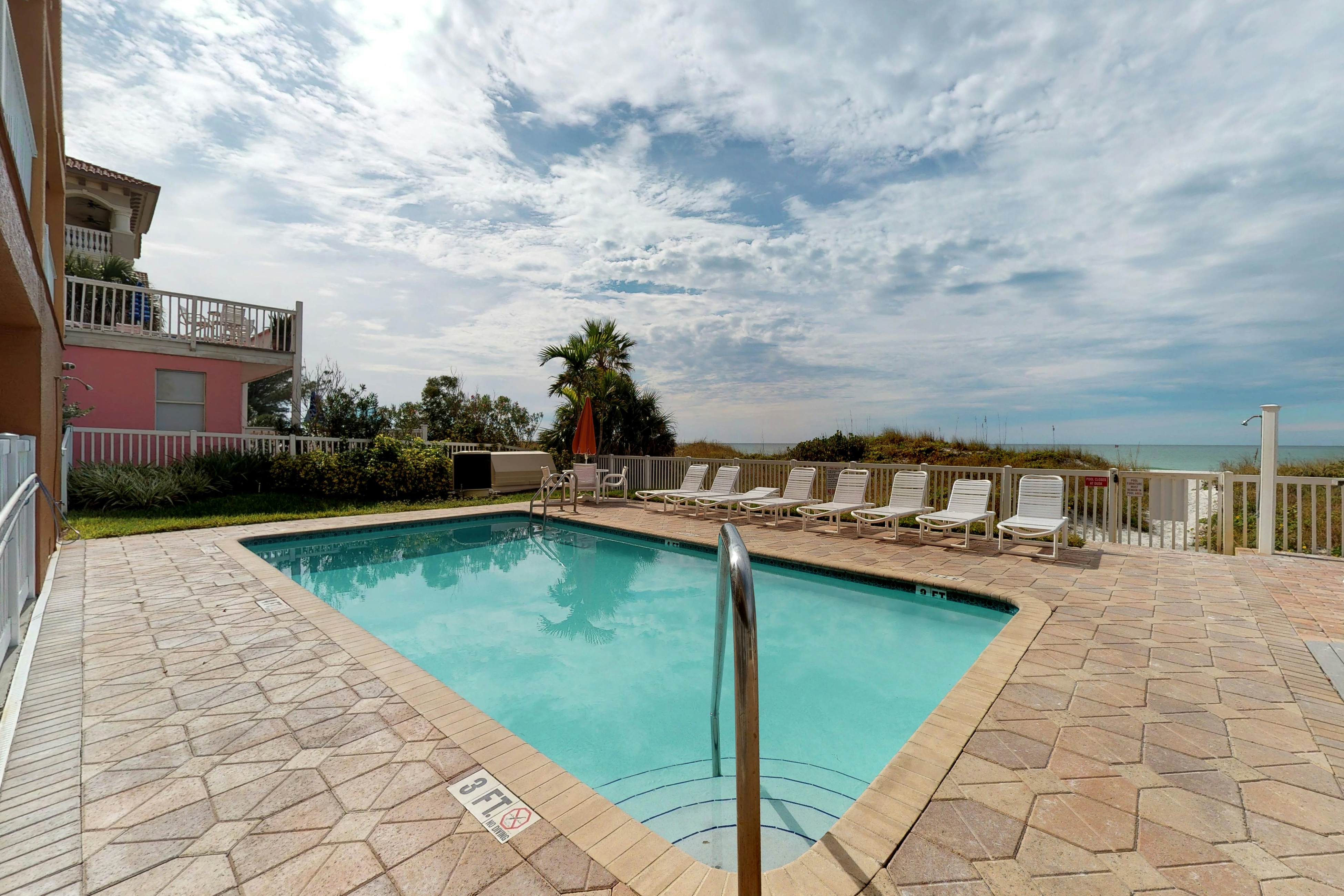 Corner waterfront condo with pool, Gulf views & easy beach access